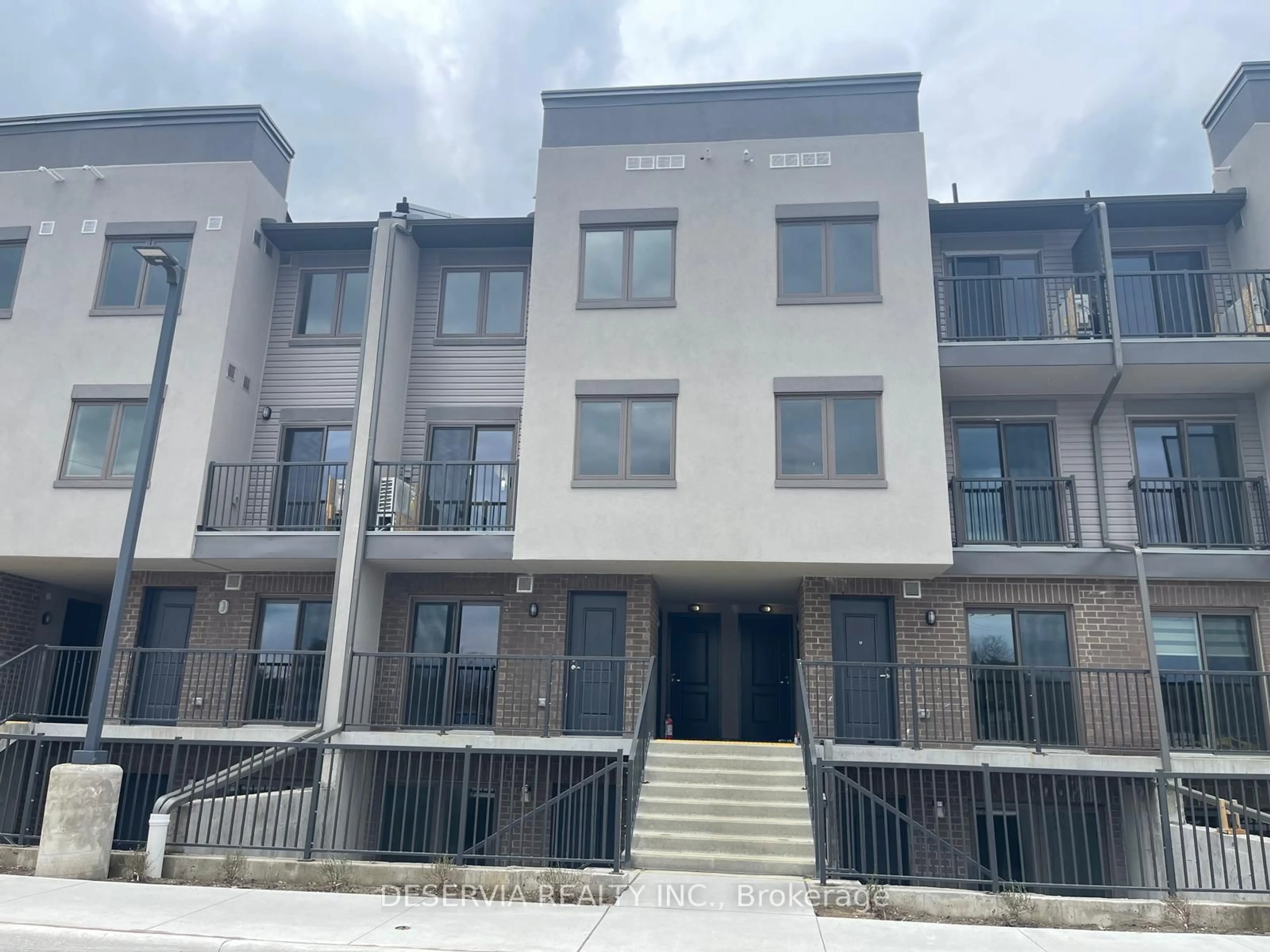 A pic from outside/outdoor area/front of a property/back of a property/a pic from drone, unknown for 350 Fisher Mills Rd #C12, Cambridge Ontario N3C 4N5