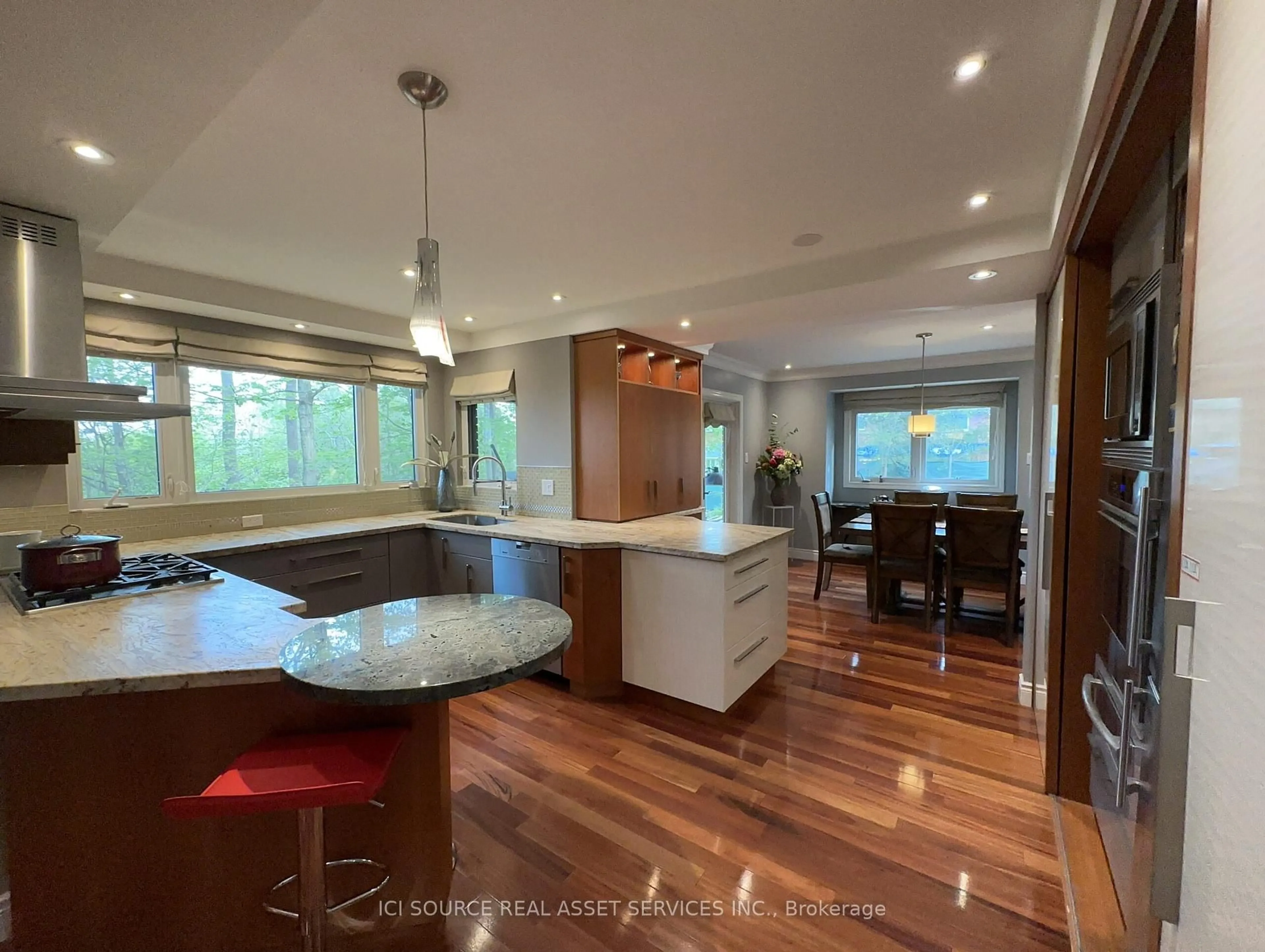 Contemporary kitchen, wood/laminate floor for 350 Sarnia Rd, London North Ontario N6G 1N3
