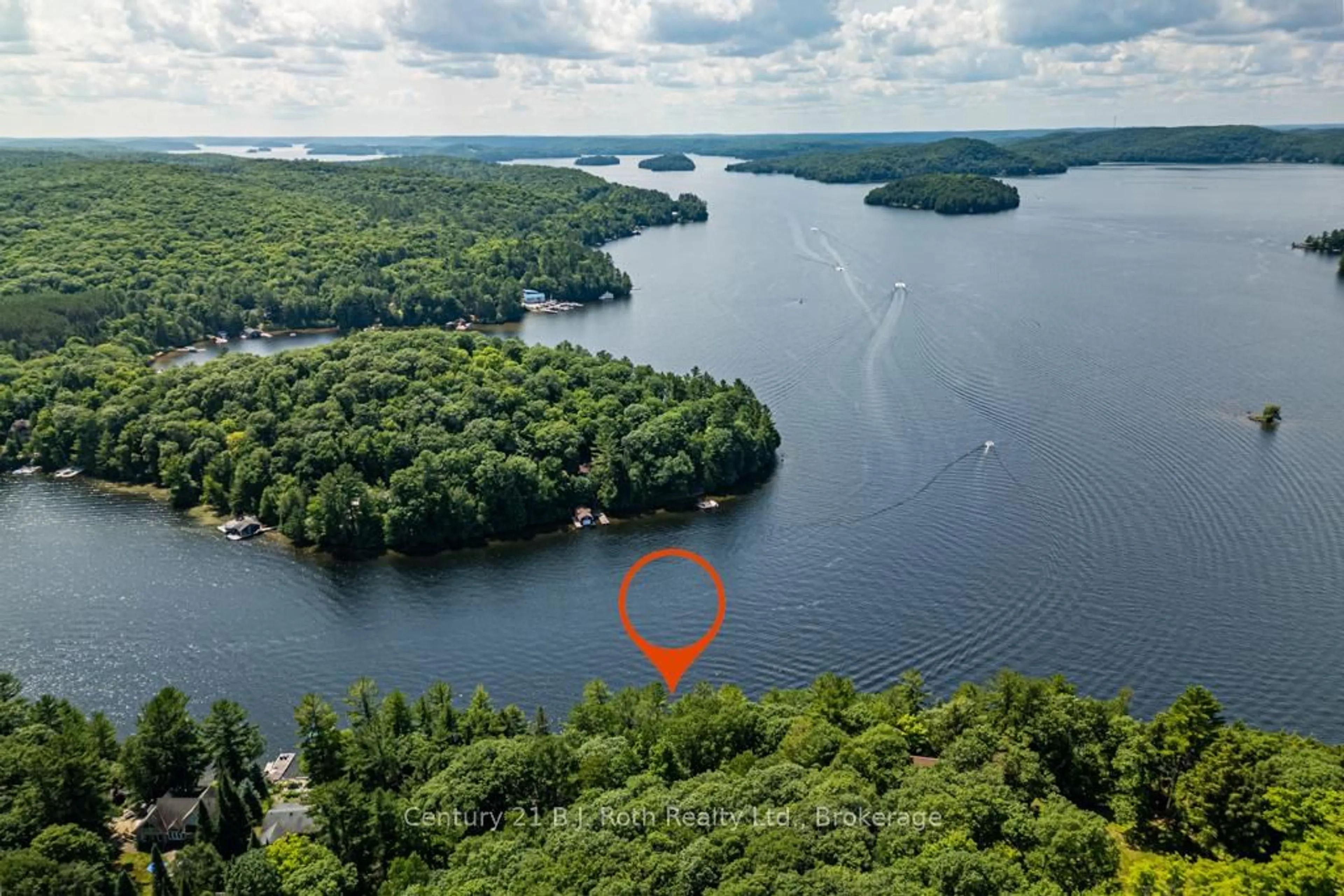A pic from outside/outdoor area/front of a property/back of a property/a pic from drone, water/lake/river/ocean view for 1033 Bayview Point Rd, Lake of Bays Ontario P0A 1H0