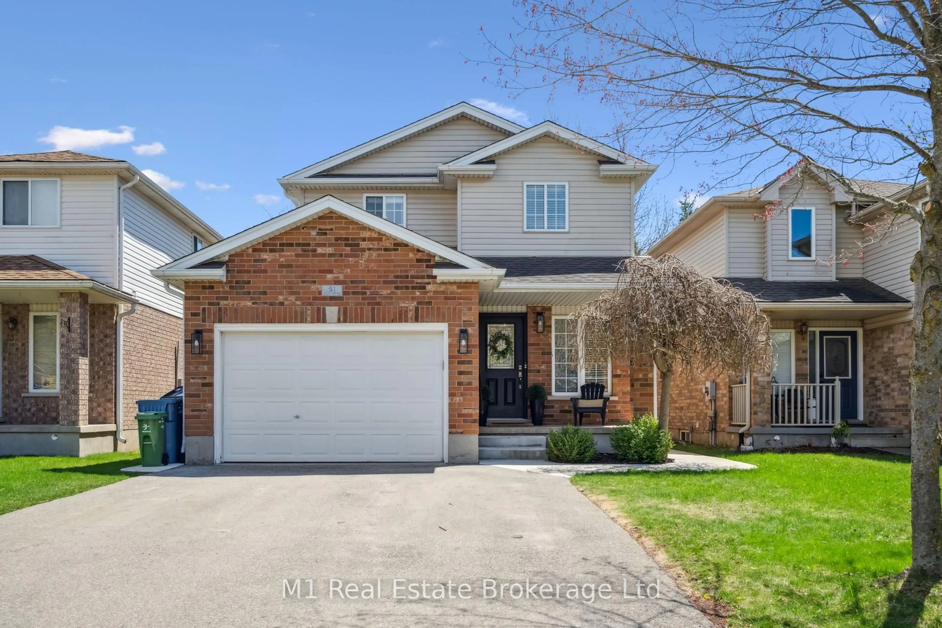 Home with brick exterior material, street for 51 Hill Tr, Guelph Ontario N1E 7C6