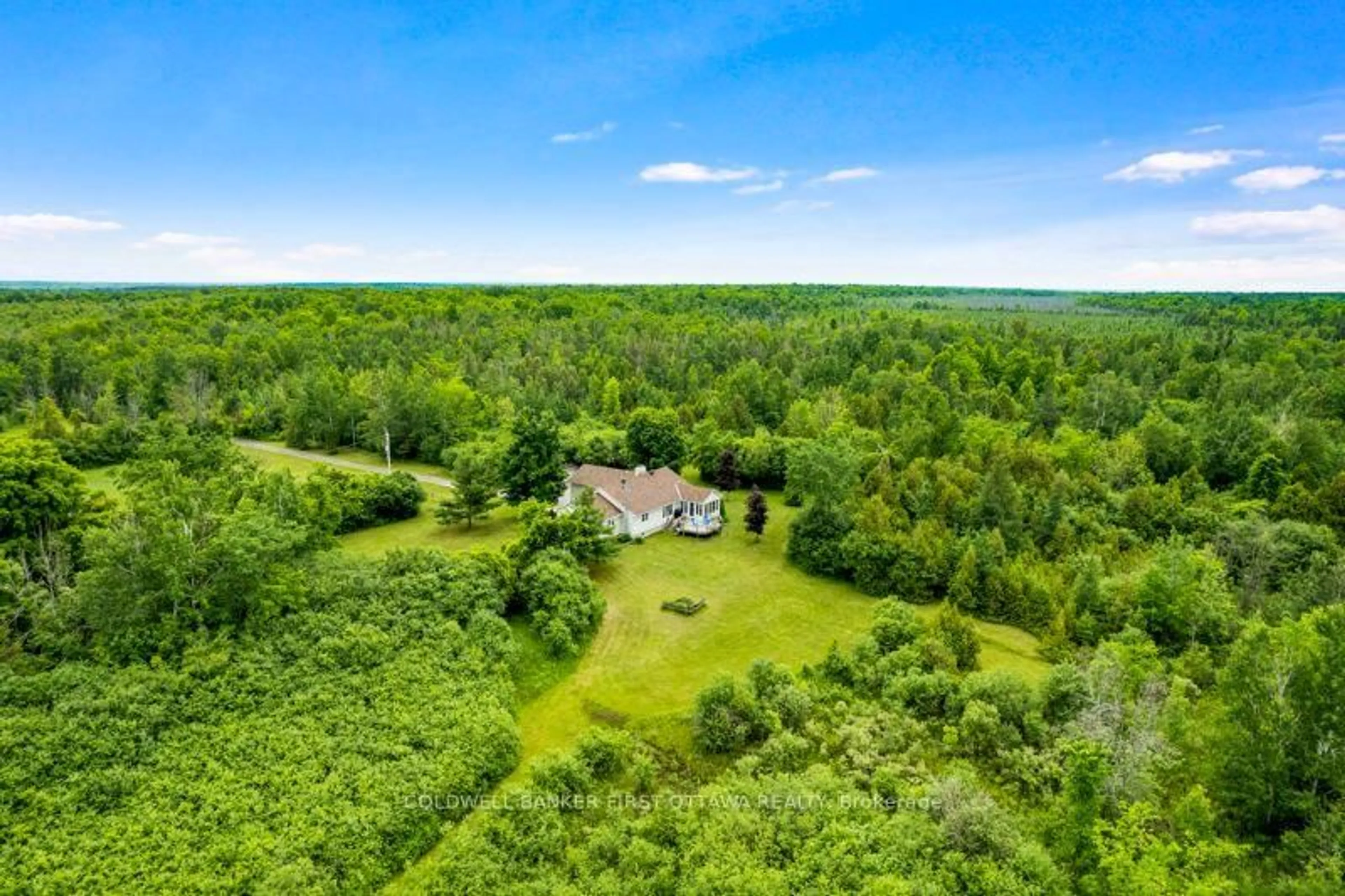 A pic from outside/outdoor area/front of a property/back of a property/a pic from drone, forest/trees view for 640 MCCONNELL Rd, Merrickville Ontario K0G 1N0