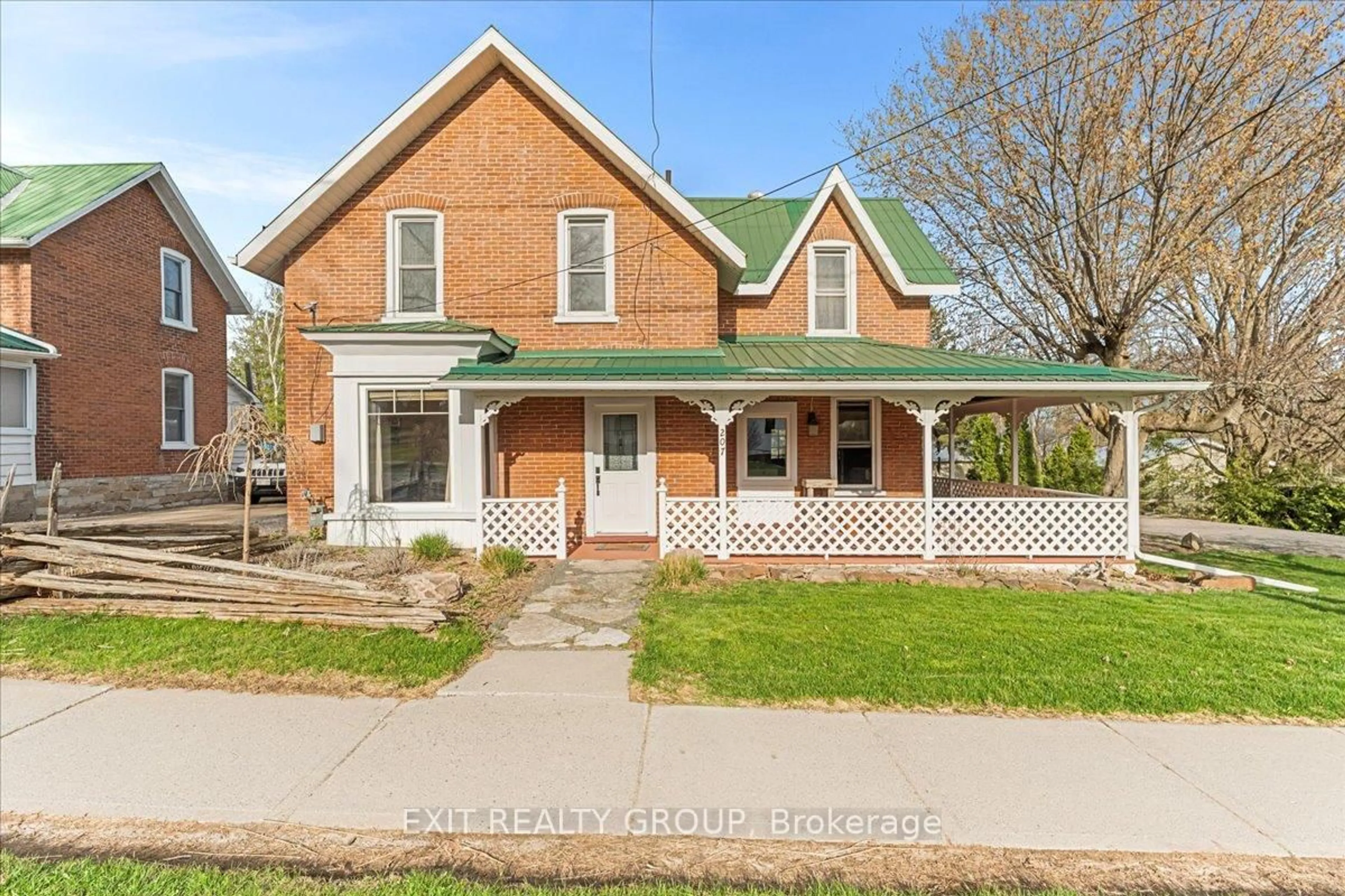 Home with brick exterior material, street for 207 Durham St, Madoc Ontario K0K 2K0