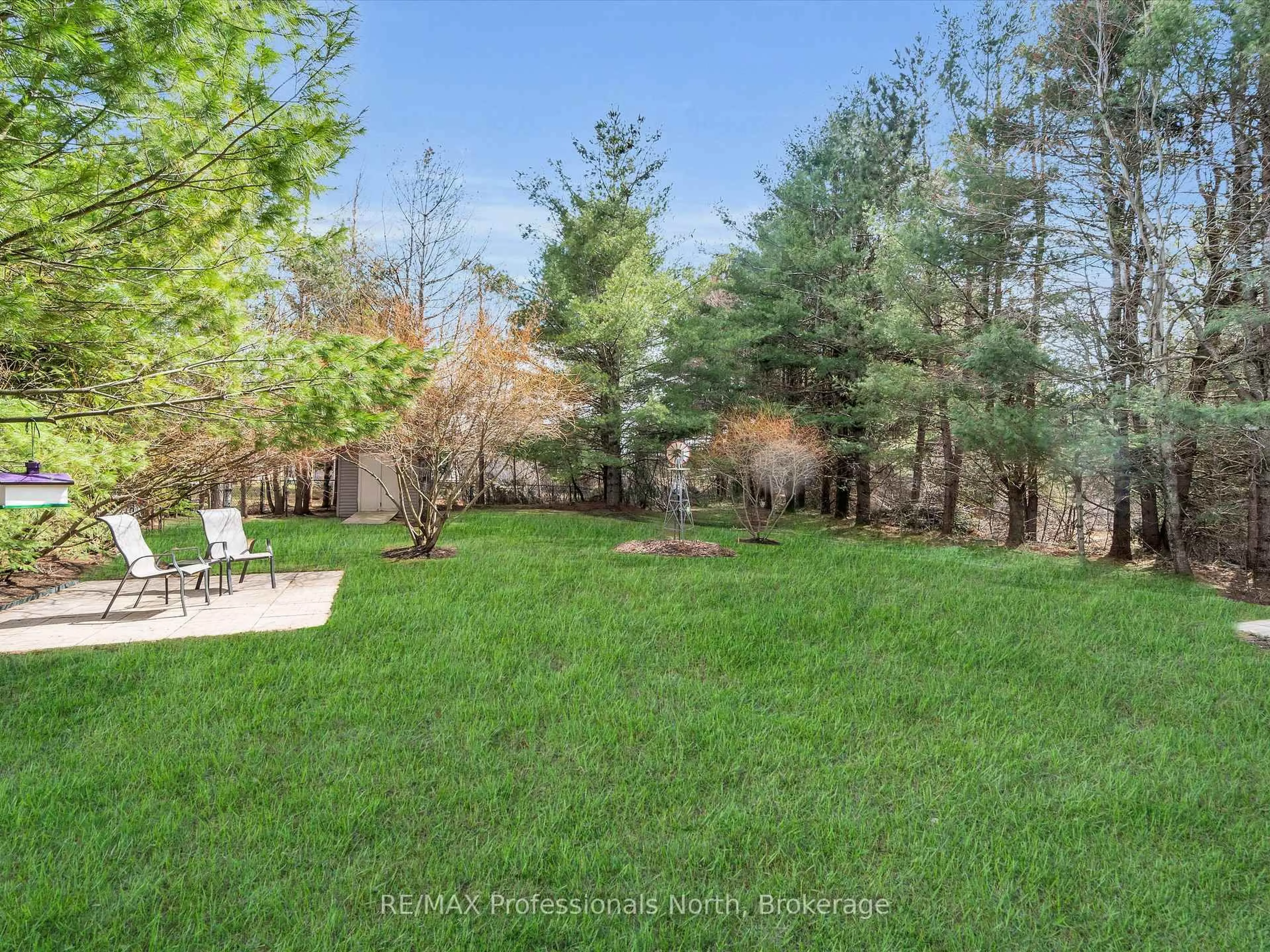 A pic from outside/outdoor area/front of a property/back of a property/a pic from drone, forest/trees view for 3 Clearstream Crt, Bracebridge Ontario P1L 0A3
