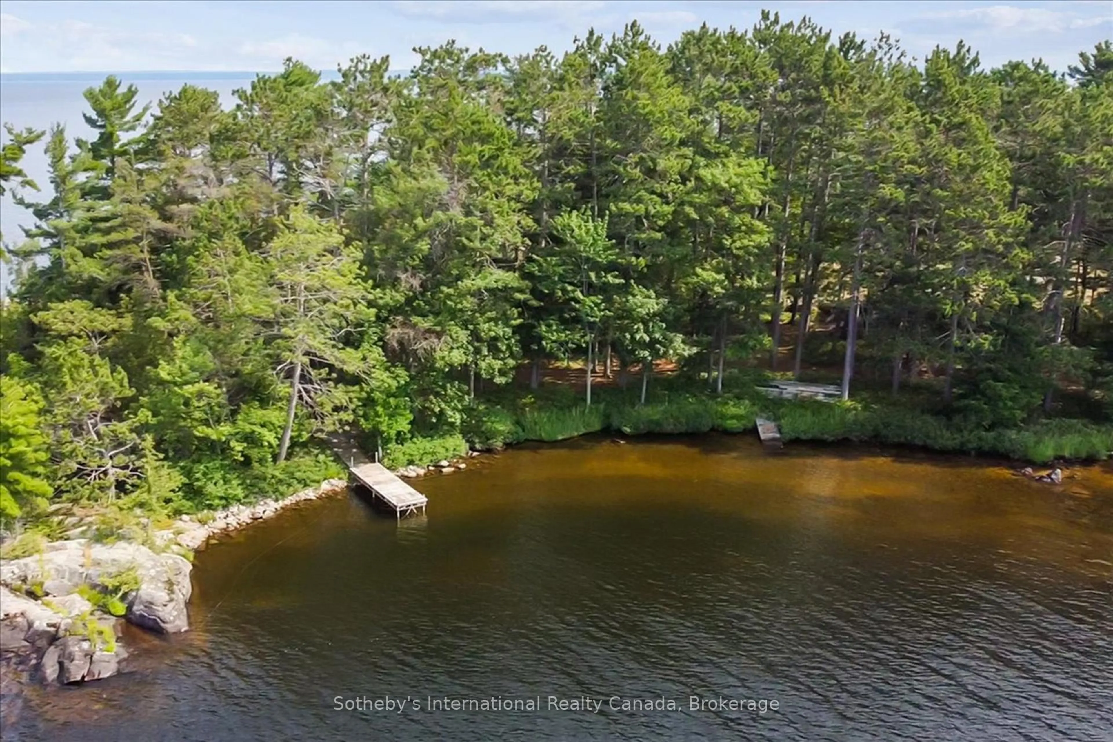 A pic from outside/outdoor area/front of a property/back of a property/a pic from drone, water/lake/river/ocean view for 1 BRILL'S ISLAND N/A, Nipissing Ontario P0H 1H0
