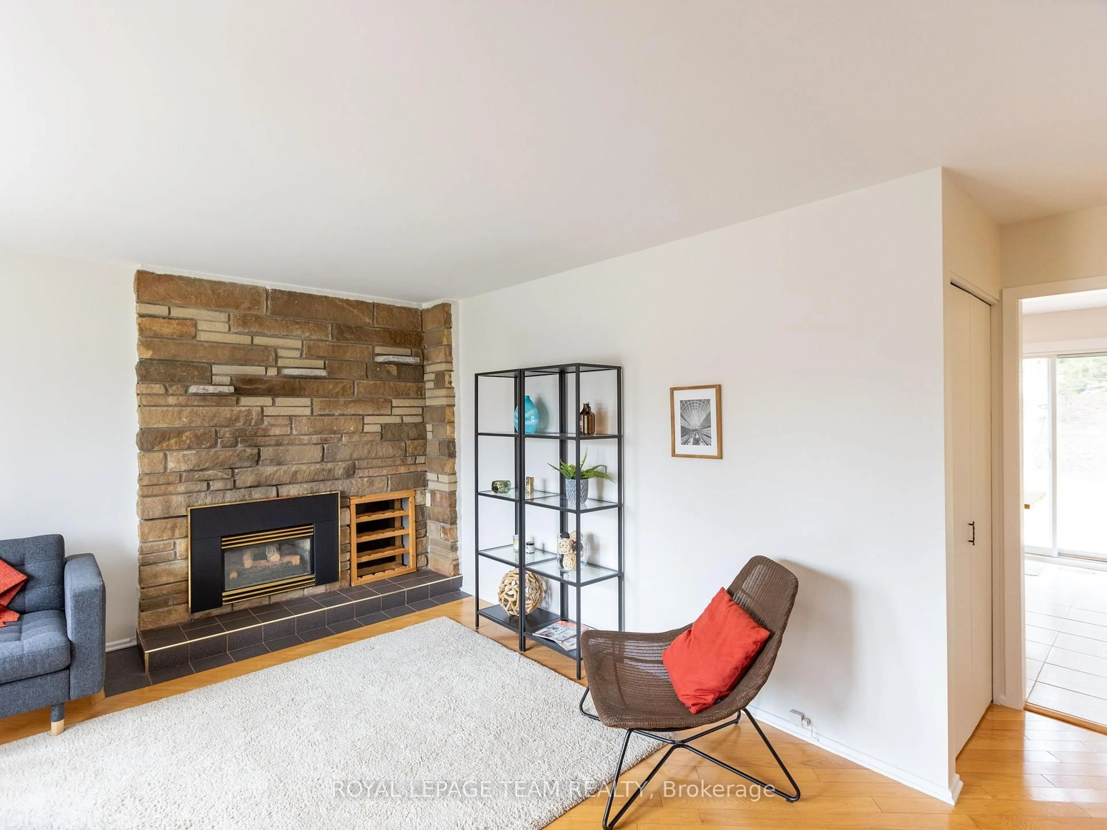 Living room with furniture, wood/laminate floor for 1357 Plumber Ave, Ottawa Ontario K1K 4B2