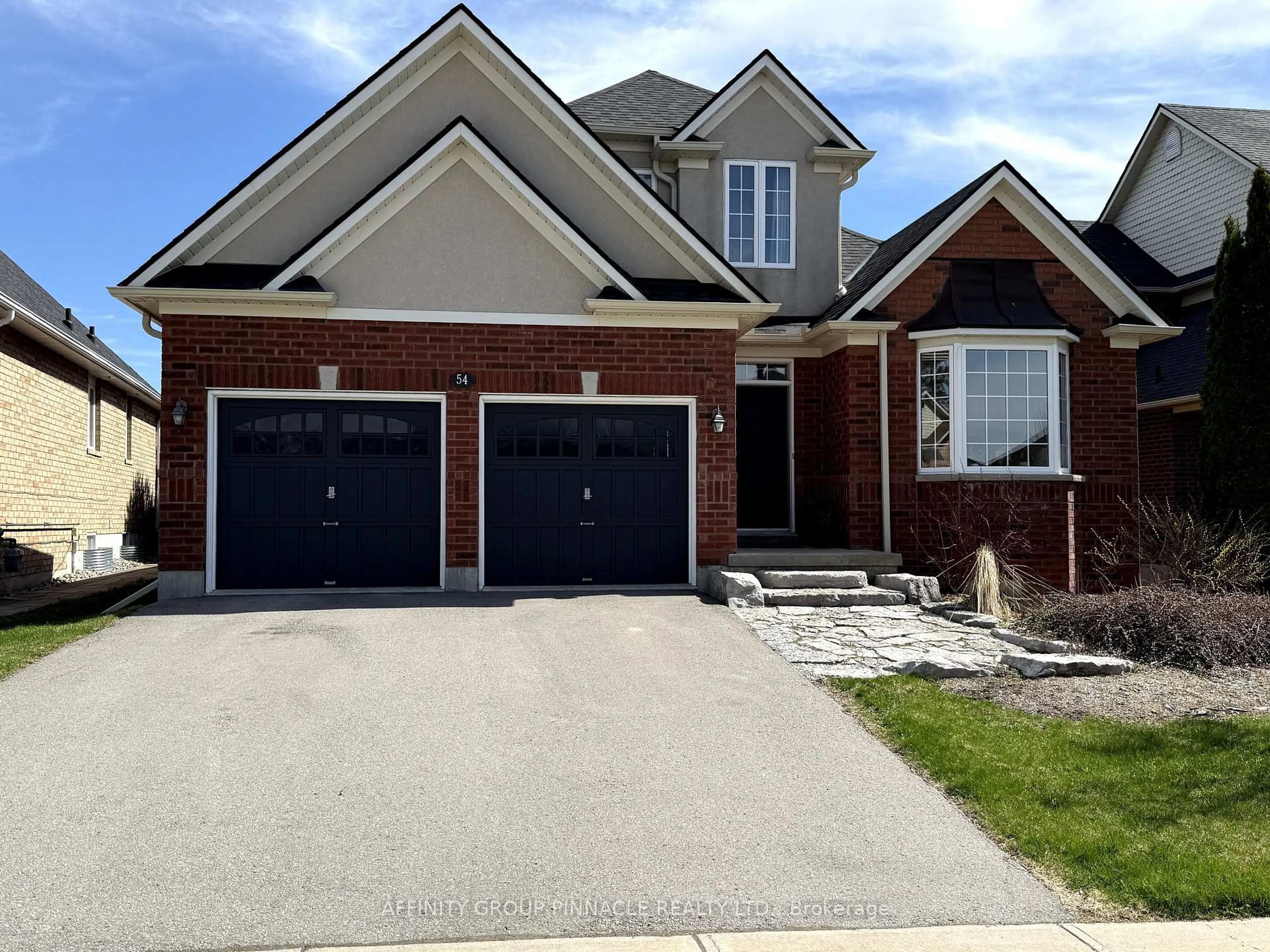 Home with brick exterior material, street for 54 Ellis Cres, Kawartha Lakes Ontario K9V 5Y1