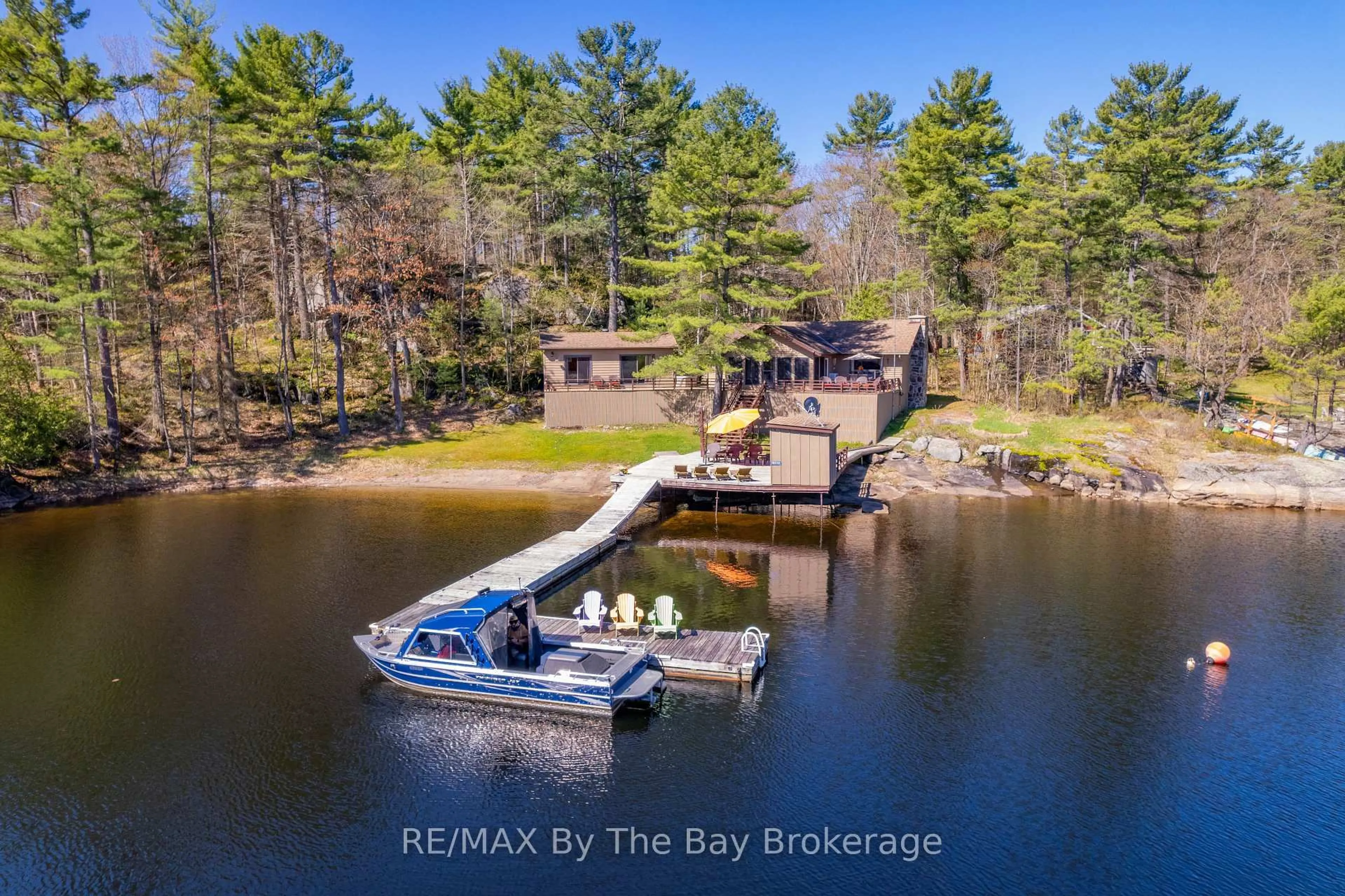 A pic from outside/outdoor area/front of a property/back of a property/a pic from drone, water/lake/river/ocean view for 18030 Georgian Bay Shr N/A, Georgian Bay Ontario P0E 1E0