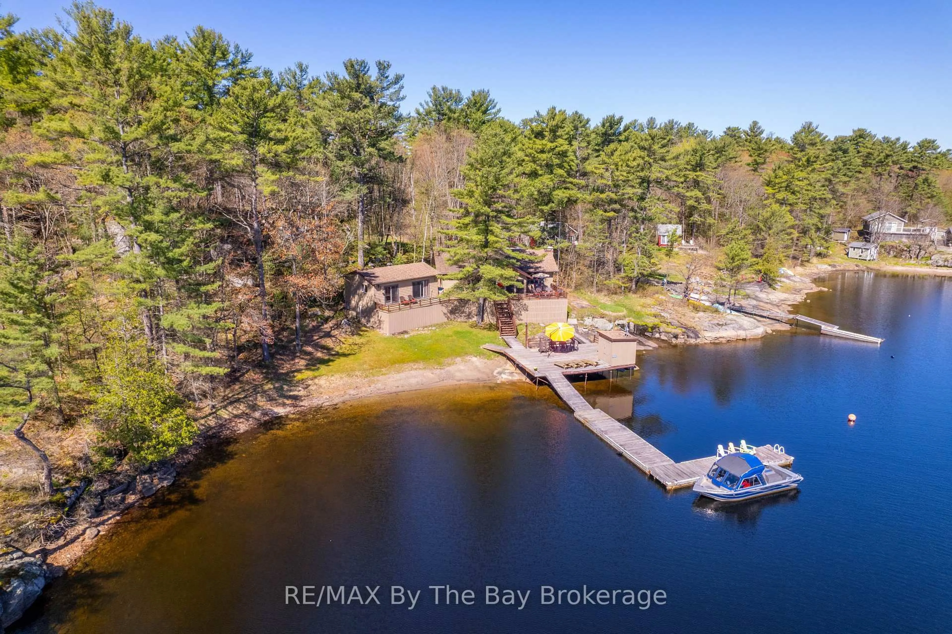 A pic from outside/outdoor area/front of a property/back of a property/a pic from drone, water/lake/river/ocean view for 18030 Georgian Bay Shr N/A, Georgian Bay Ontario P0E 1E0