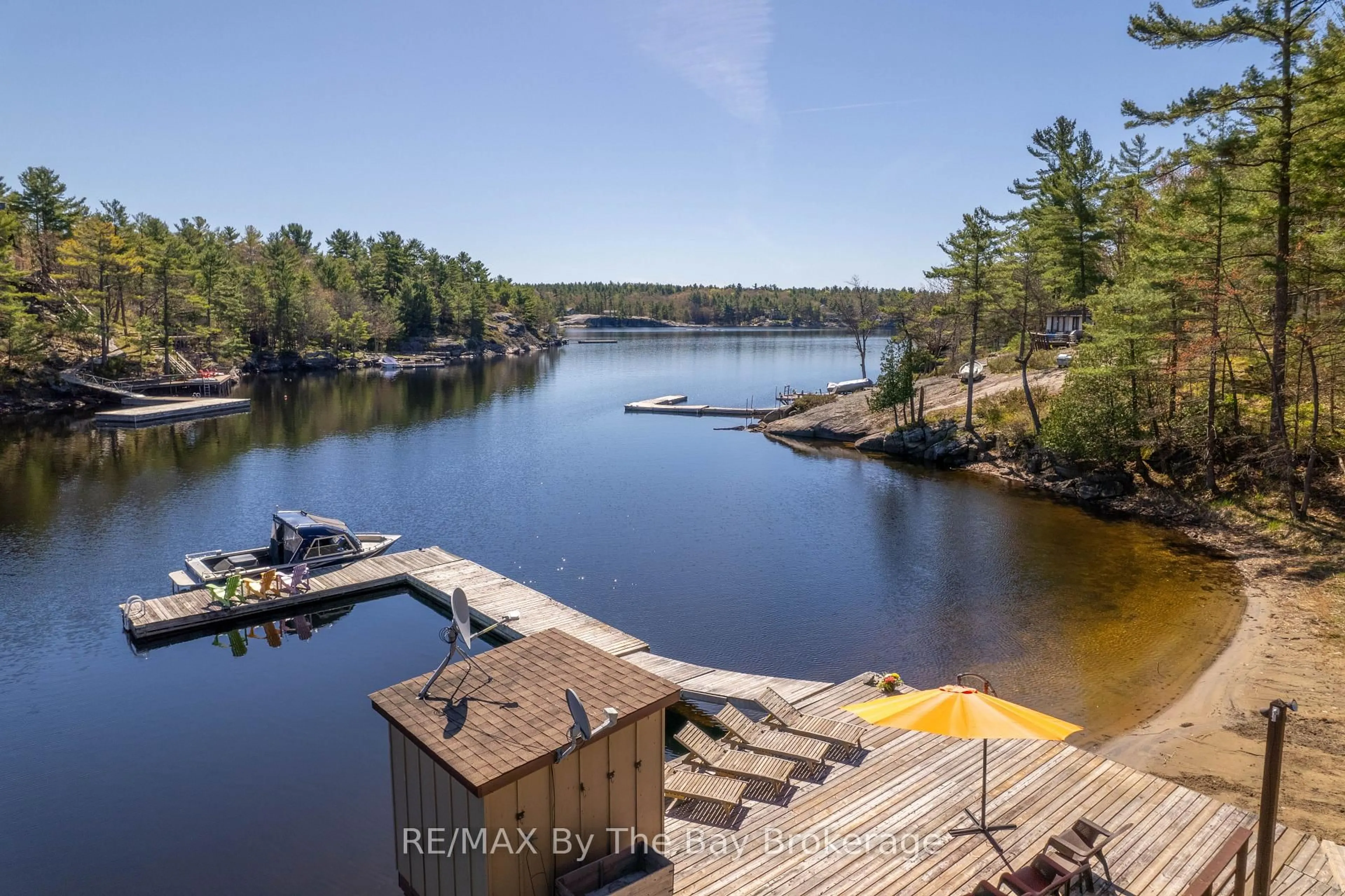 A pic from outside/outdoor area/front of a property/back of a property/a pic from drone, water/lake/river/ocean view for 18030 Georgian Bay Shr N/A, Georgian Bay Ontario P0E 1E0