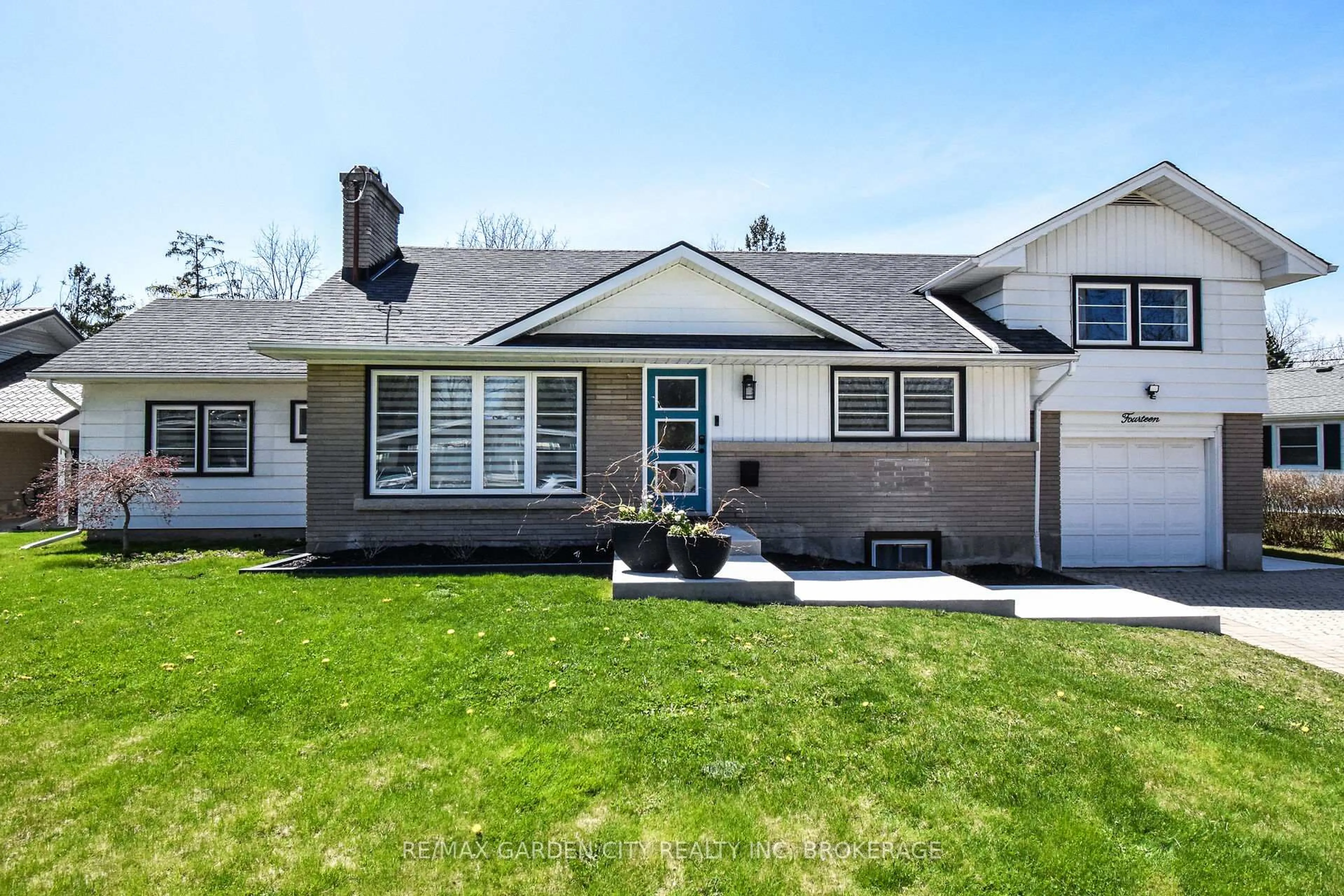 Home with vinyl exterior material, street for 14 Elmridge Dr, St. Catharines Ontario L2T 2A6