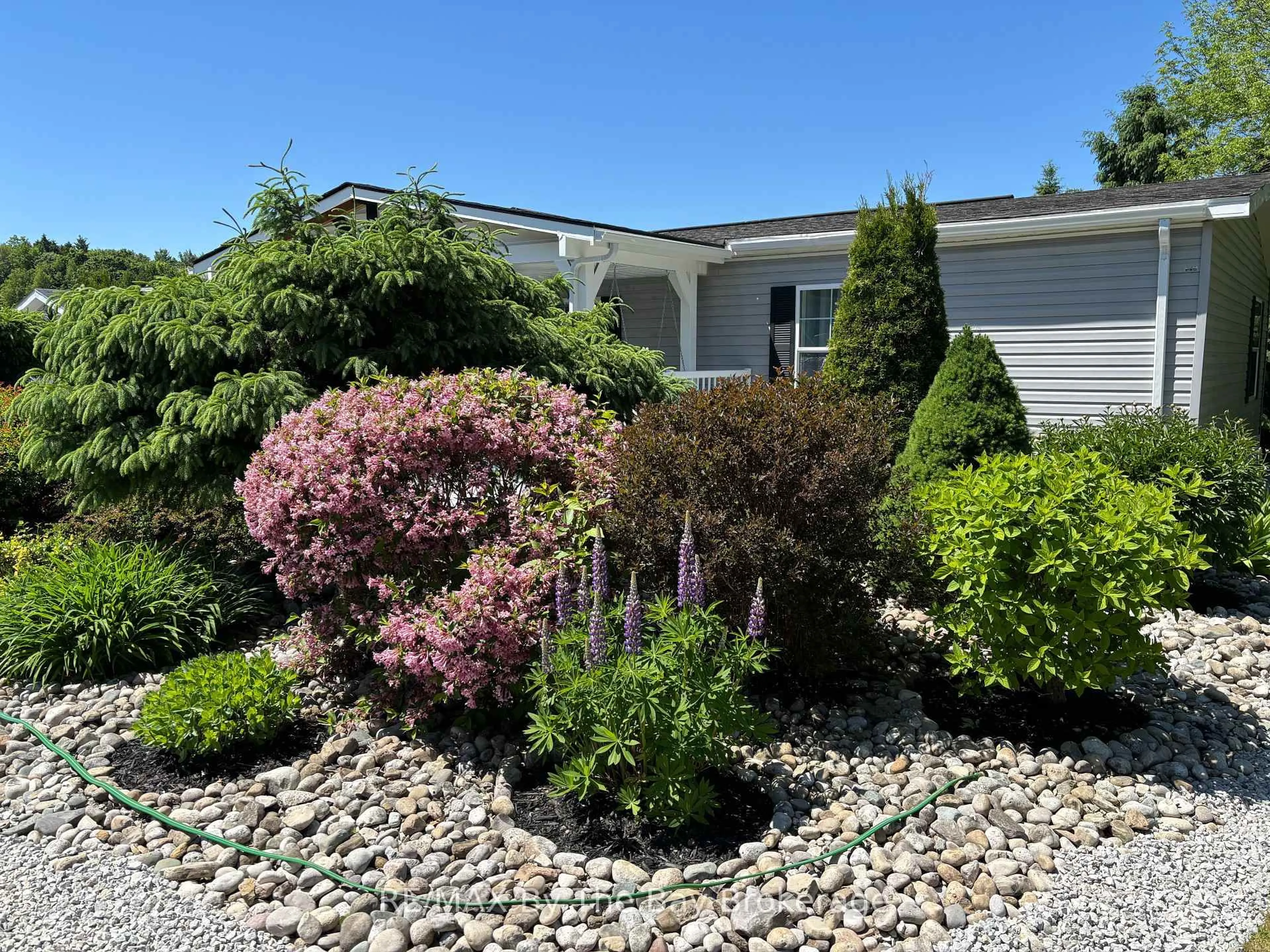 A pic from outside/outdoor area/front of a property/back of a property/a pic from drone, street for 102 Rosewood Dr, Georgian Bluffs Ontario N4K 5N5