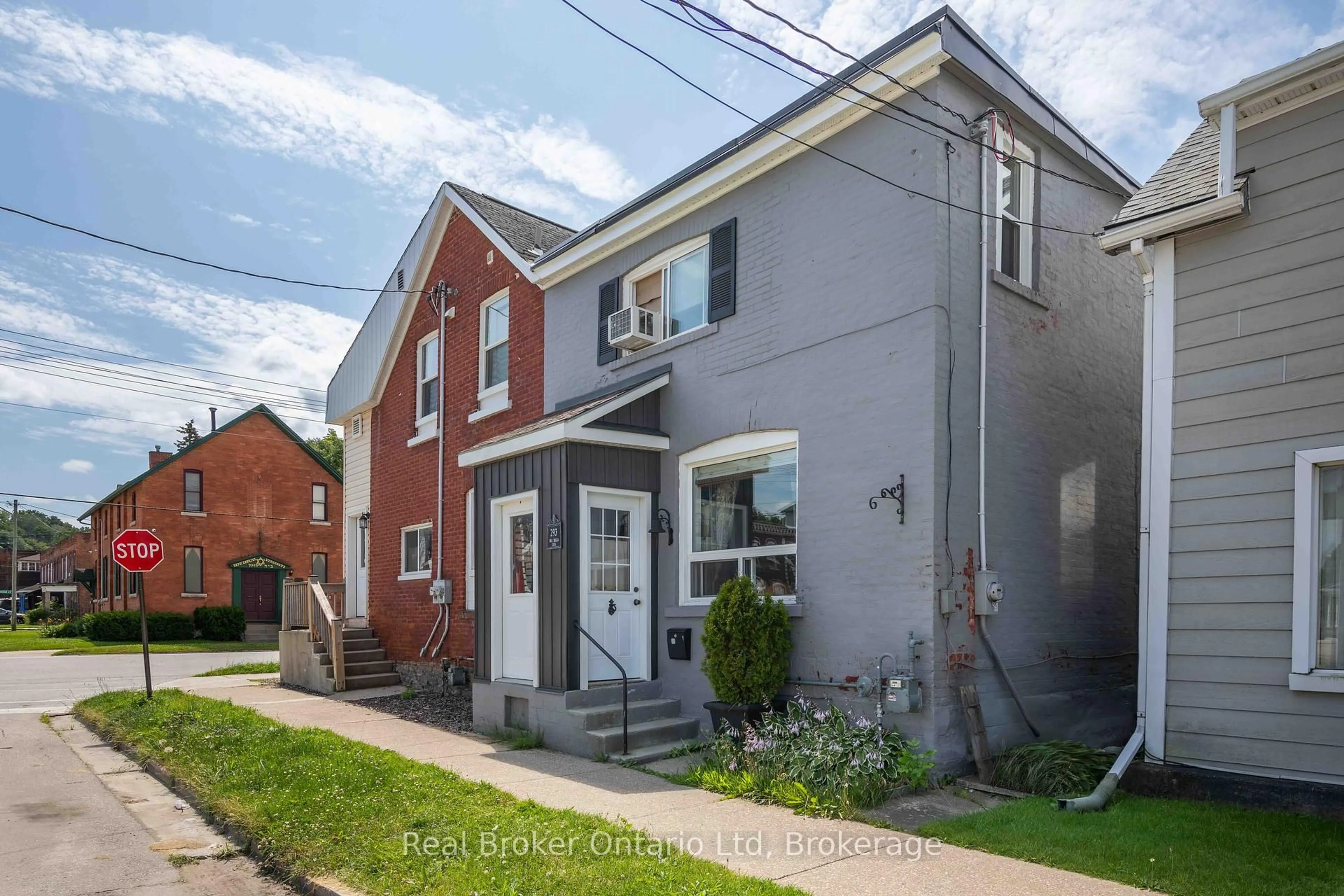 Home with brick exterior material, street for 293 11th St, Owen Sound Ontario N4K 1T8