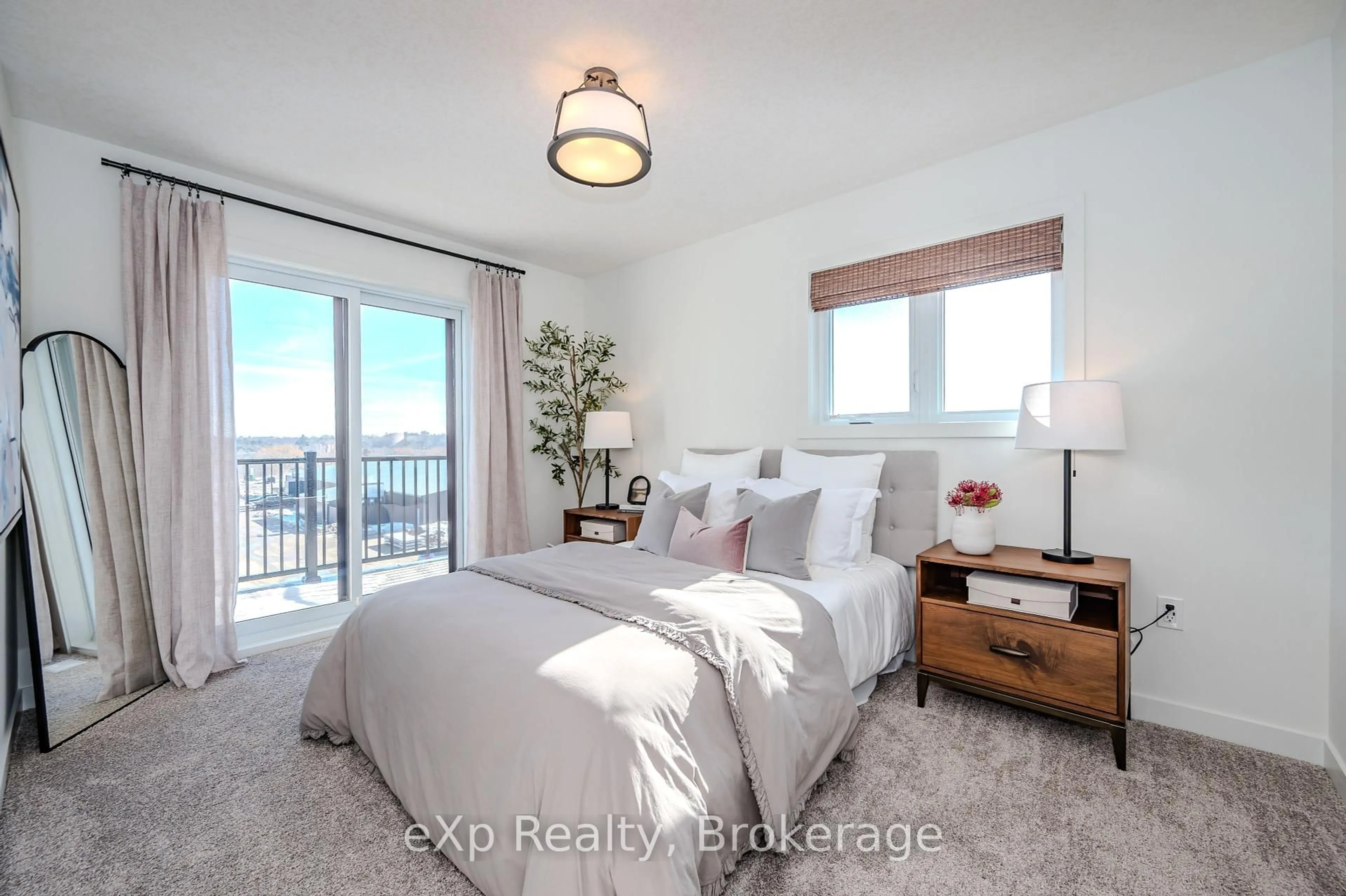 Bedroom with bed, wood/laminate floor for 824 Woolwich St #102, Guelph Ontario N1H 1G8
