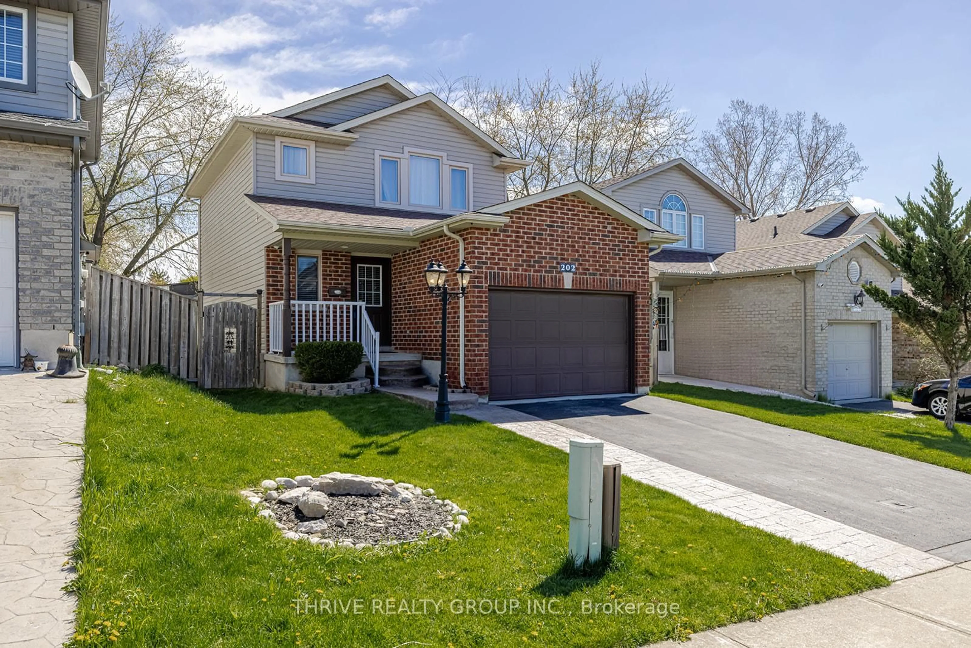Home with brick exterior material, street for 202 Crimson Cres, London East Ontario N5W 6G1