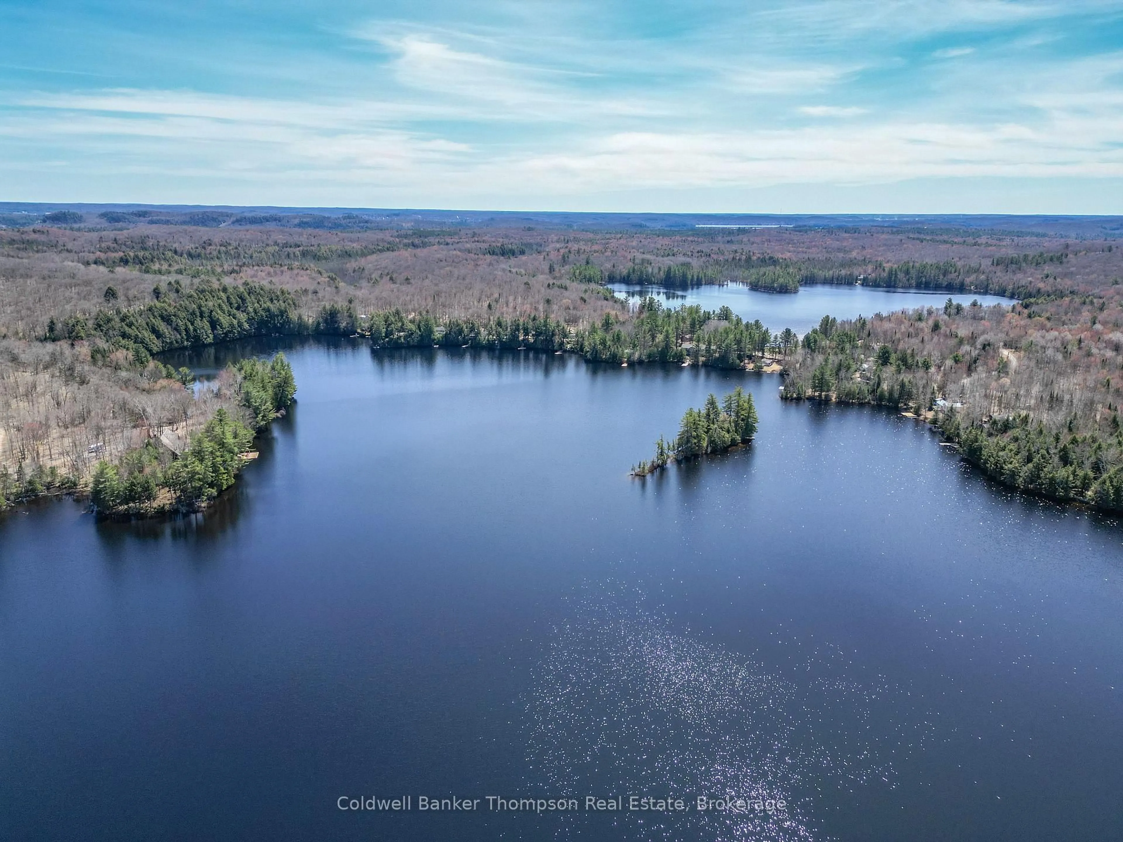 A pic from outside/outdoor area/front of a property/back of a property/a pic from drone, water/lake/river/ocean view for 810 East Waseosa Lake Rd, Huntsville Ontario P1H 2J4