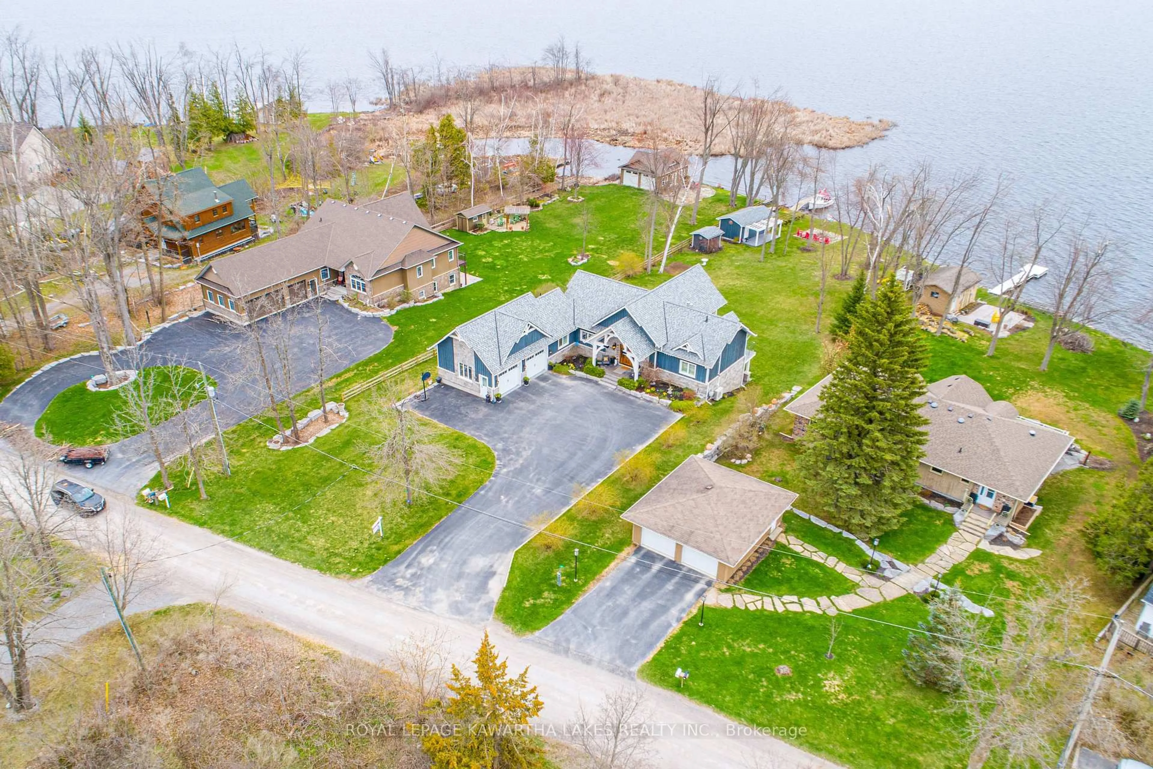 A pic from outside/outdoor area/front of a property/back of a property/a pic from drone, street for 56 Falls Bay Rd, Kawartha Lakes Ontario K0M 1A0