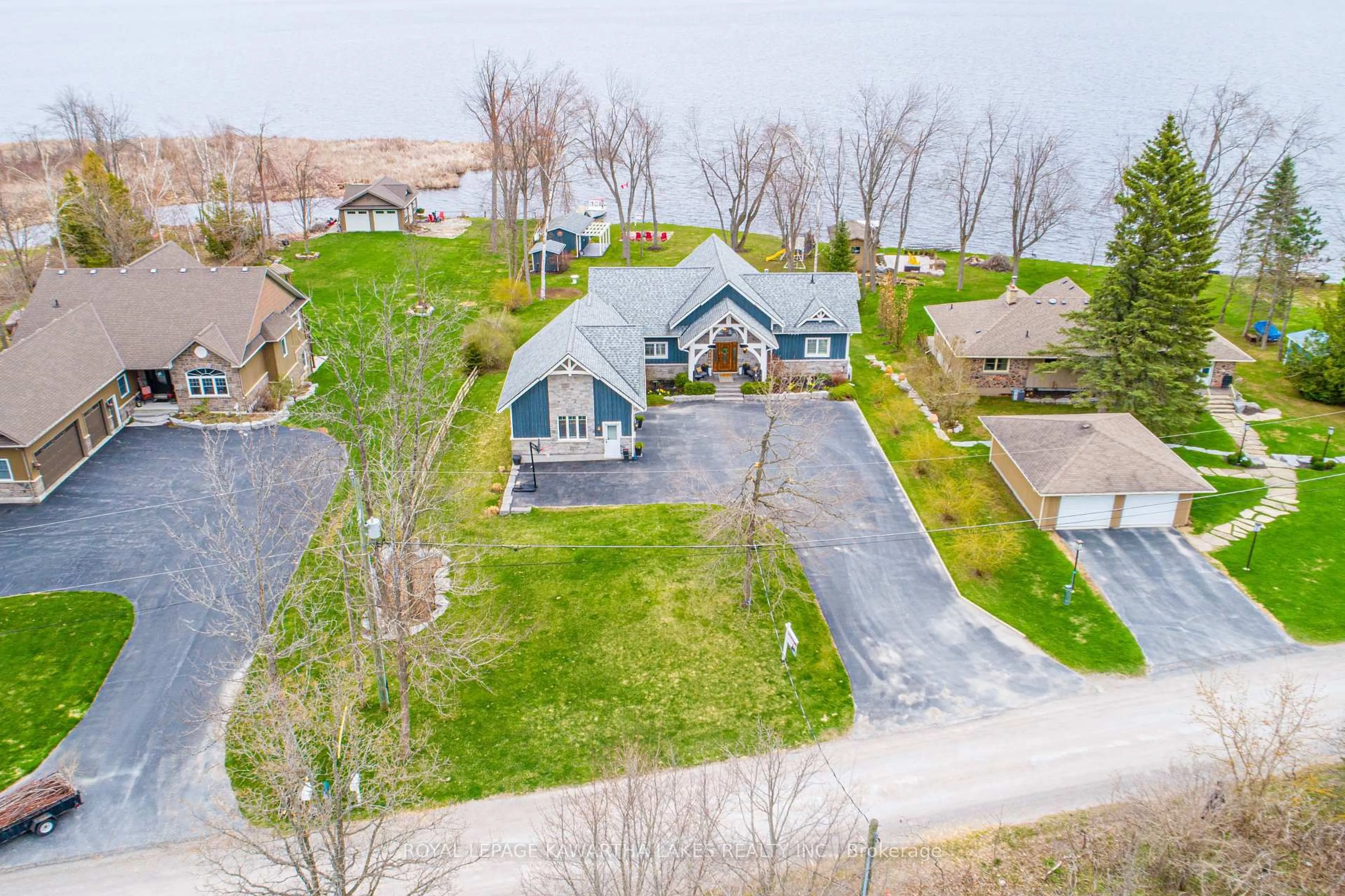 A pic from outside/outdoor area/front of a property/back of a property/a pic from drone, street for 56 Falls Bay Rd, Kawartha Lakes Ontario K0M 1A0
