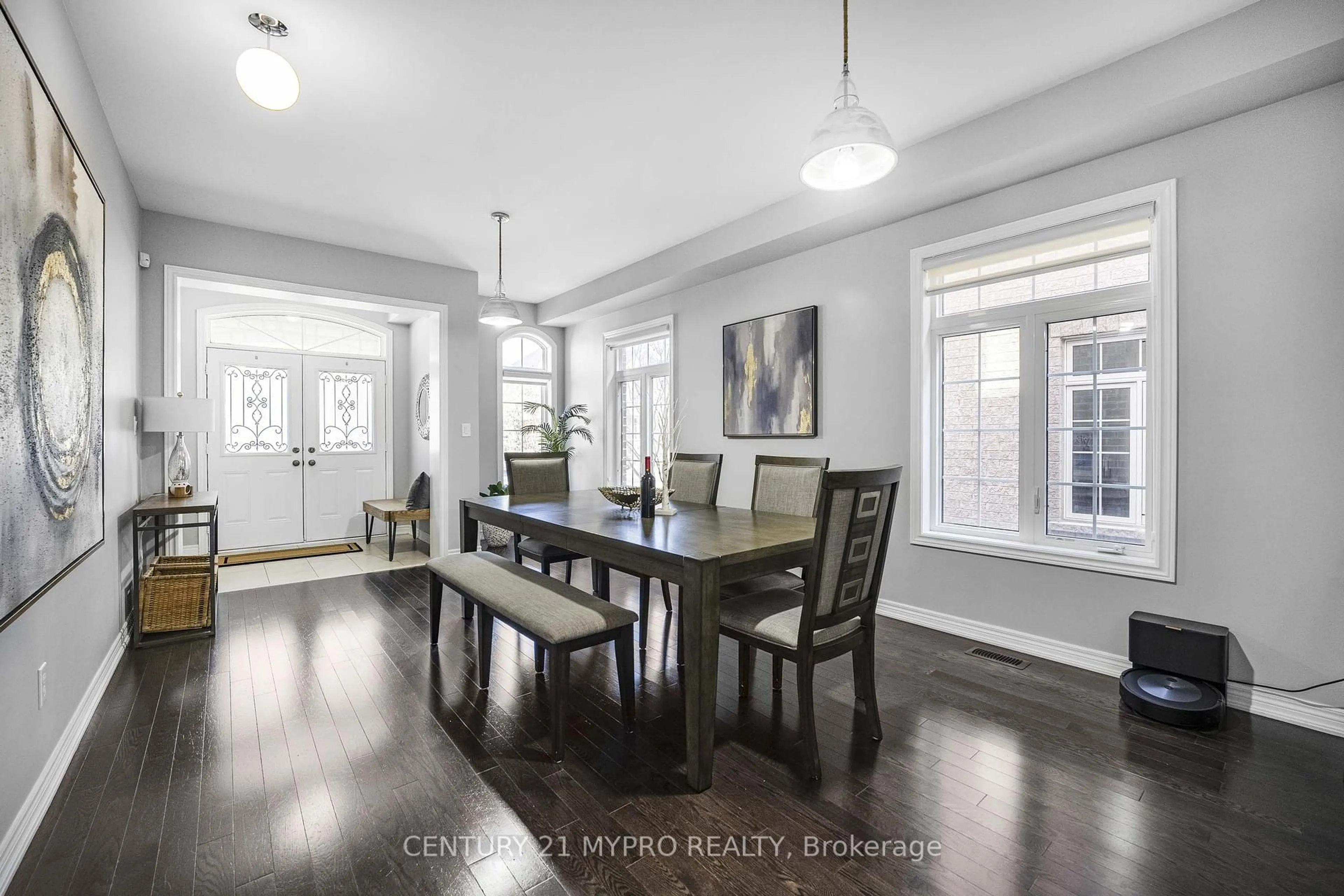Dining room, wood/laminate floor for 19 Mcknight Ave, Hamilton Ontario L8B 0R5