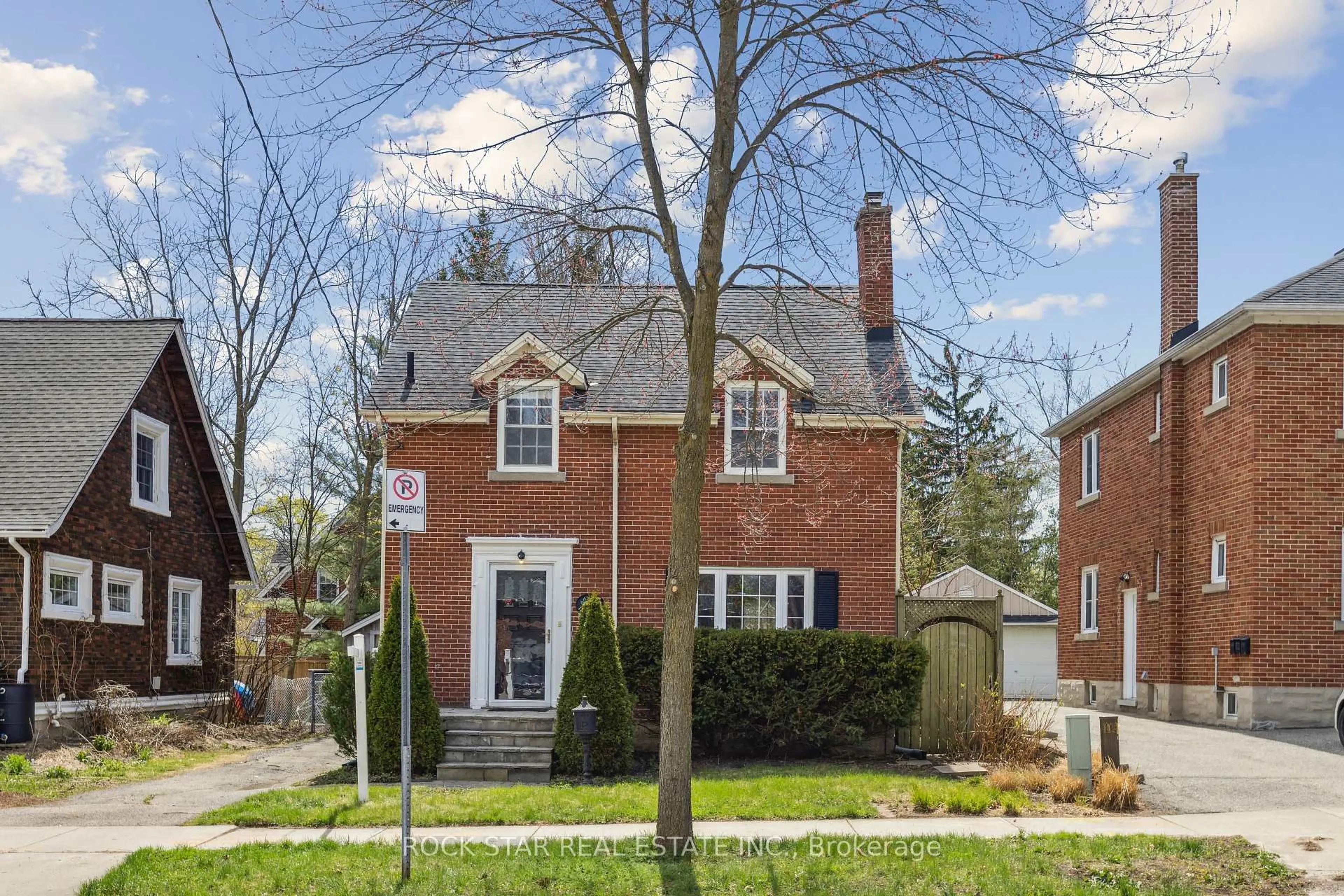 Home with brick exterior material, street for 127 Krug St, Kitchener Ontario N2H 2Y1