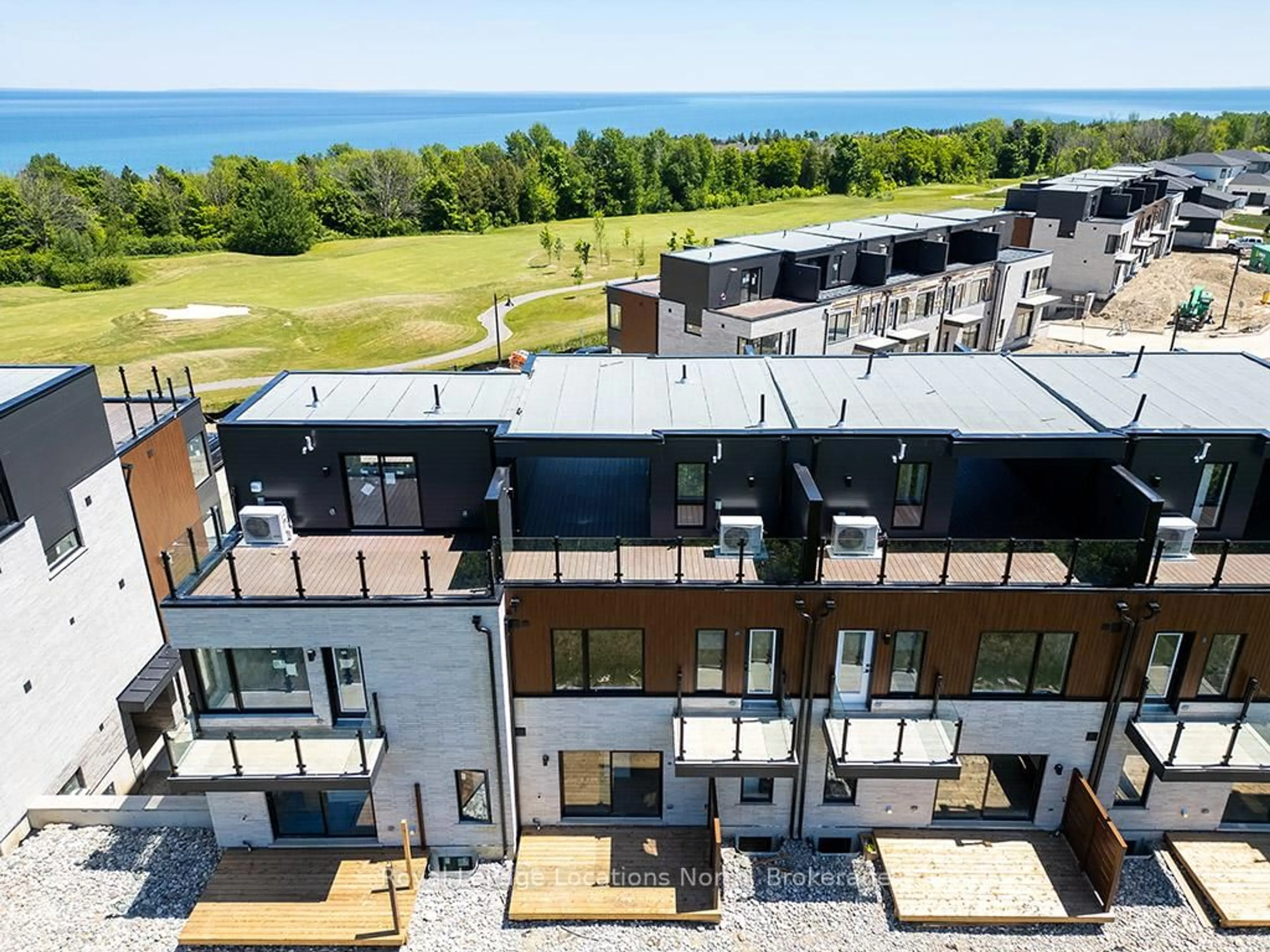 A pic from outside/outdoor area/front of a property/back of a property/a pic from drone, water/lake/river/ocean view for 117 Sladden Crt #18, Blue Mountains Ontario N0H 2P0