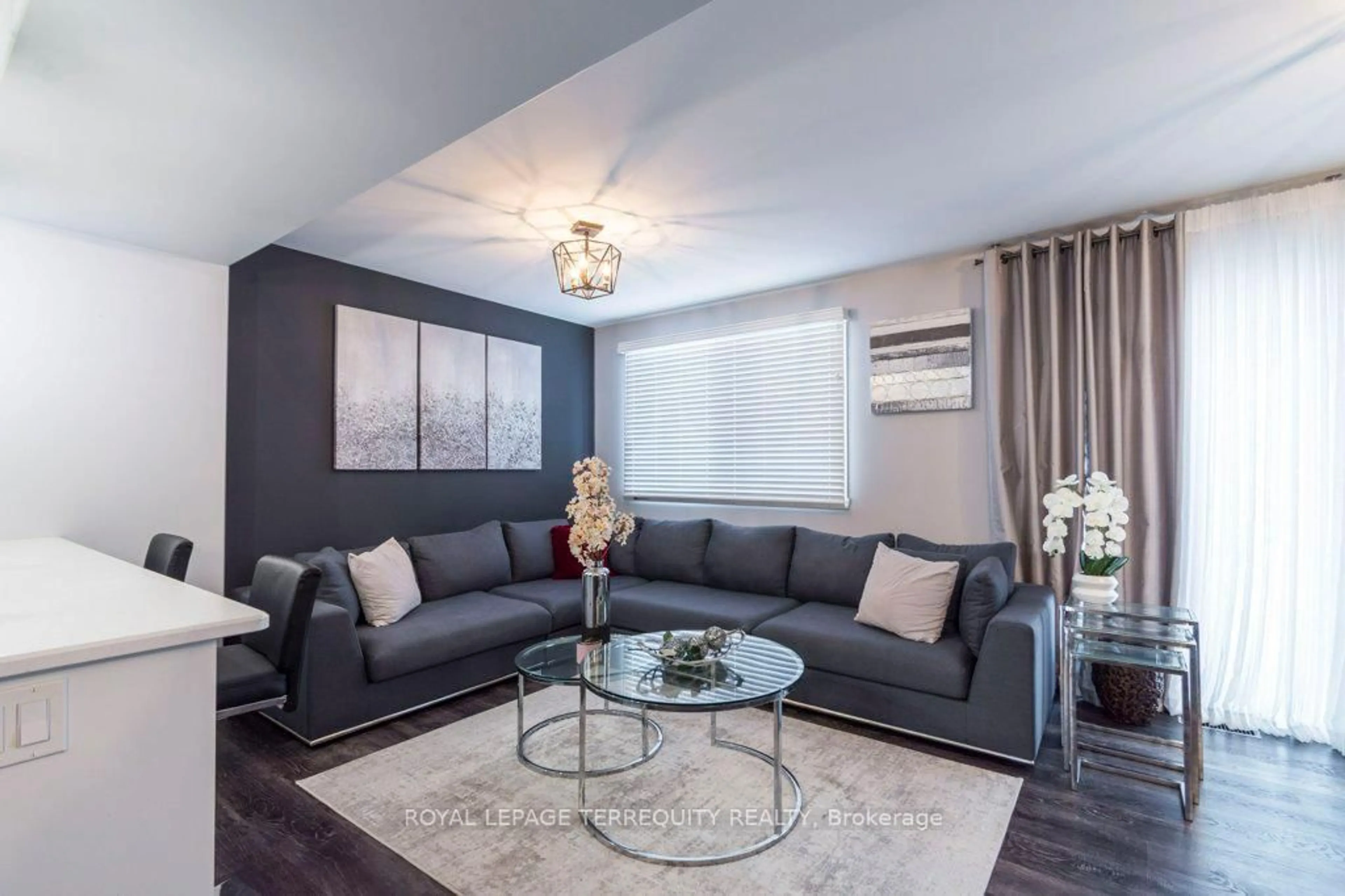 Living room with furniture, wood/laminate floor for 12 Cedar Park Cres, Quinte West Ontario K8V 0J2