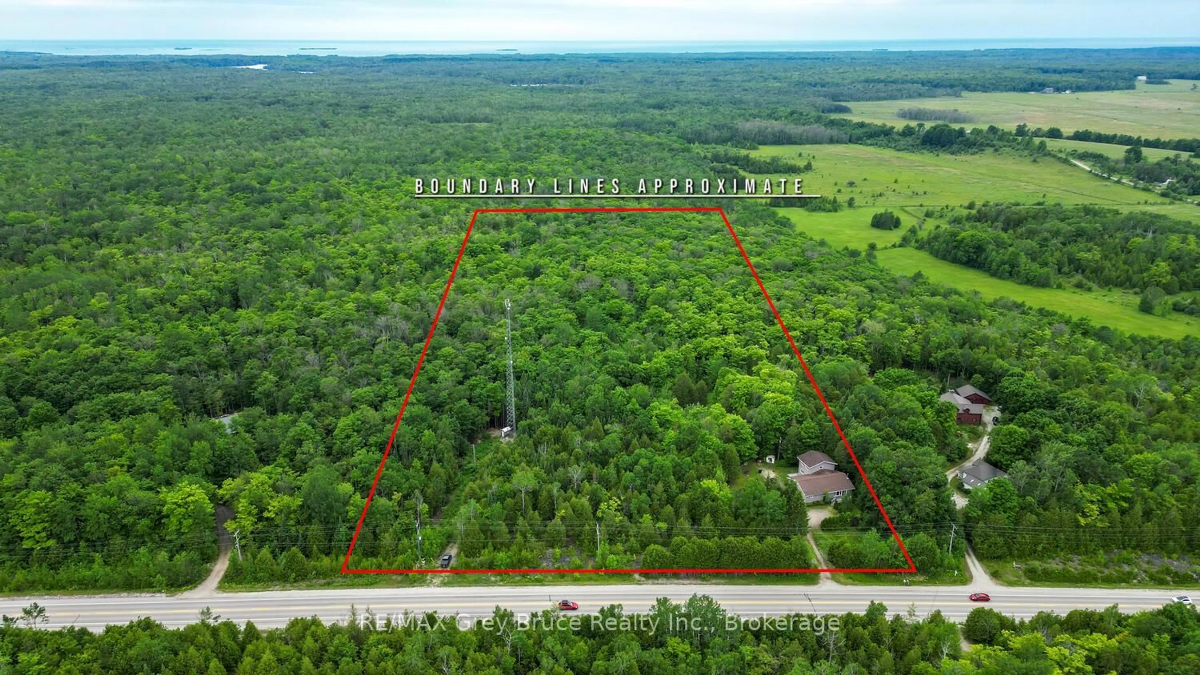 A pic from outside/outdoor area/front of a property/back of a property/a pic from drone, forest/trees view for 1477 Highway 6 Highway, South Bruce Peninsula Ontario N0H 2T0