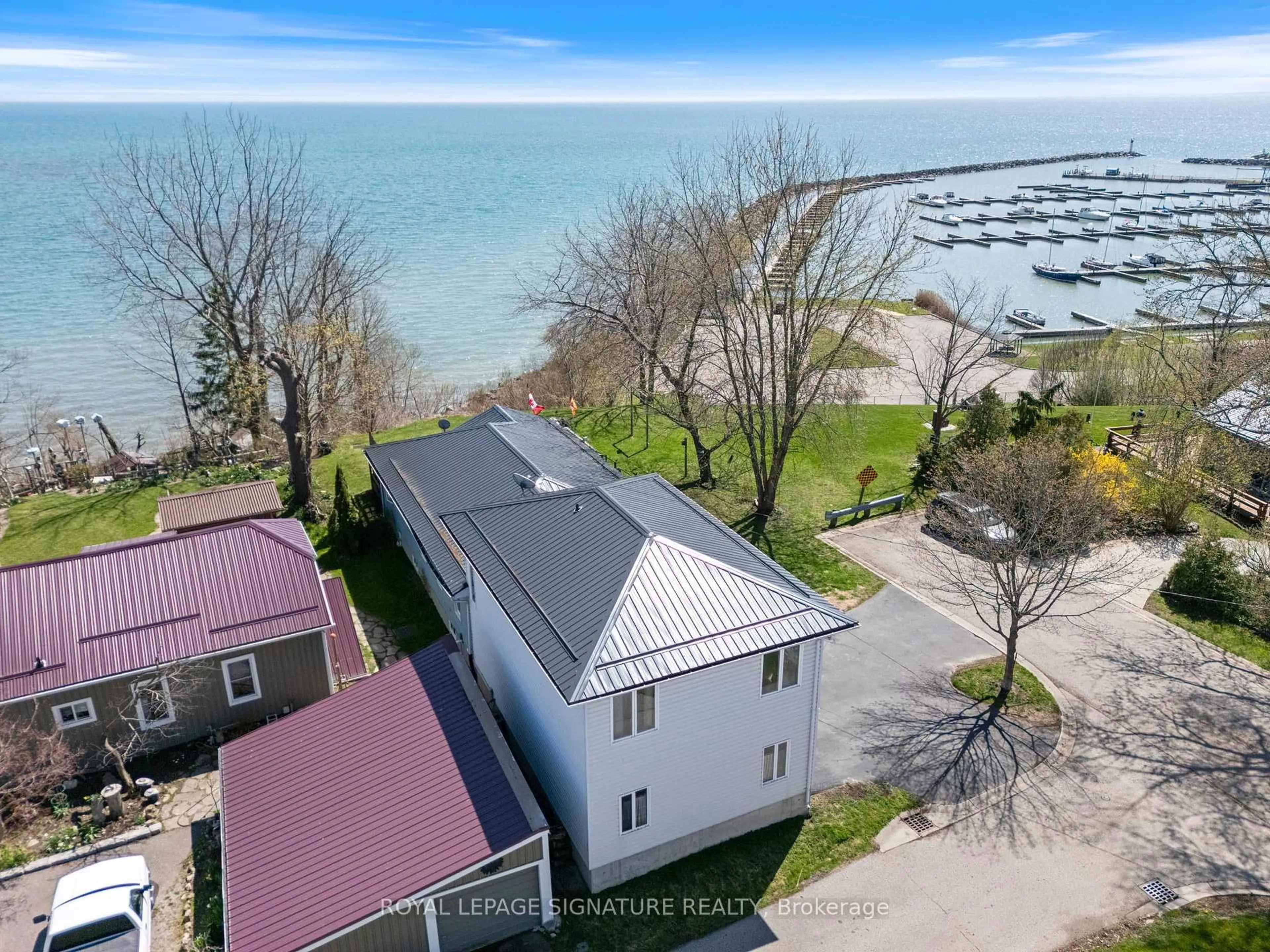 A pic from outside/outdoor area/front of a property/back of a property/a pic from drone, water/lake/river/ocean view for 2 Buena St, Norfolk Ontario N0A 1N7