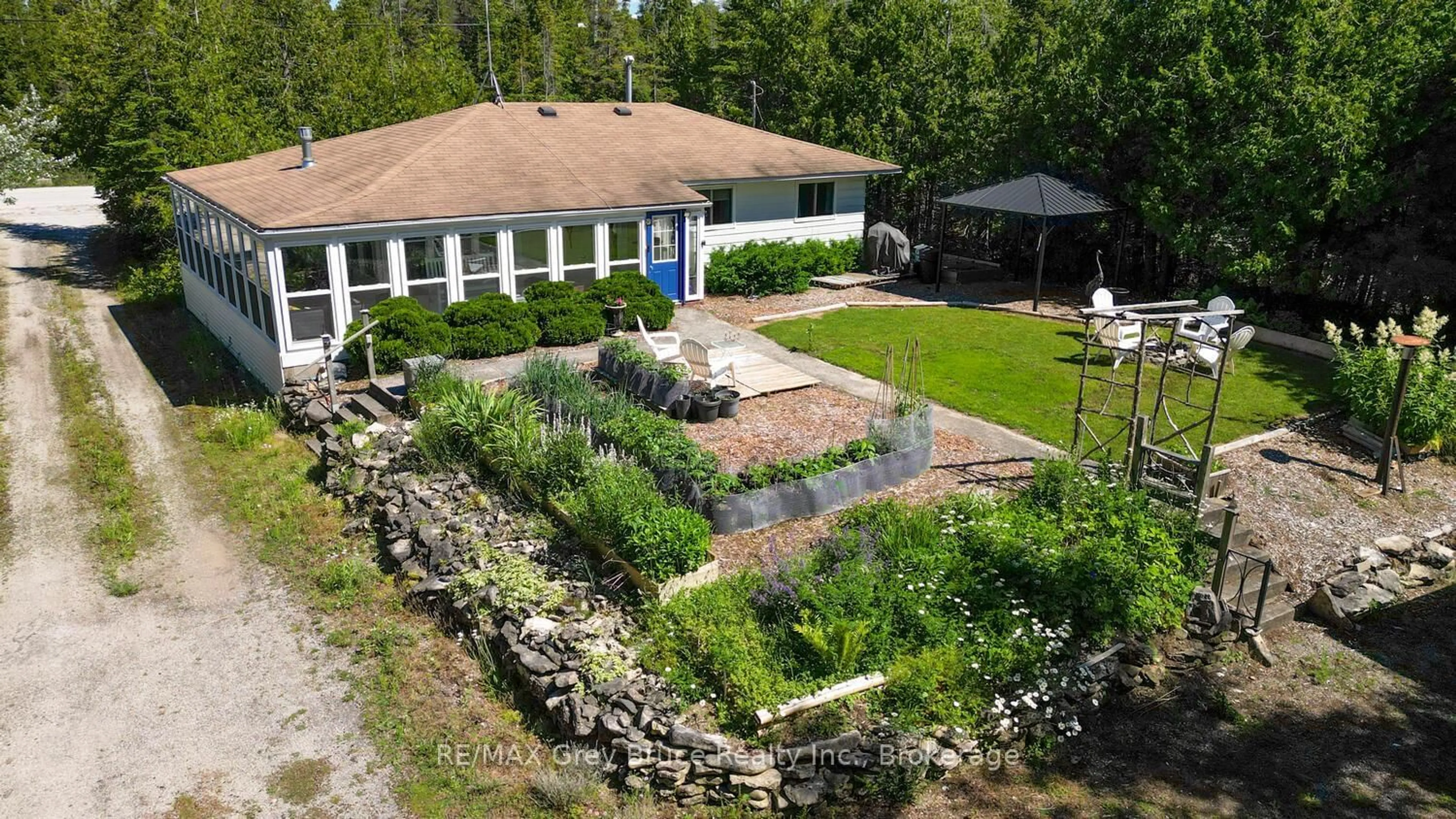 A pic from outside/outdoor area/front of a property/back of a property/a pic from drone, building for 1034 DORCAS BAY Rd, Northern Bruce Peninsula Ontario N0H 2R0