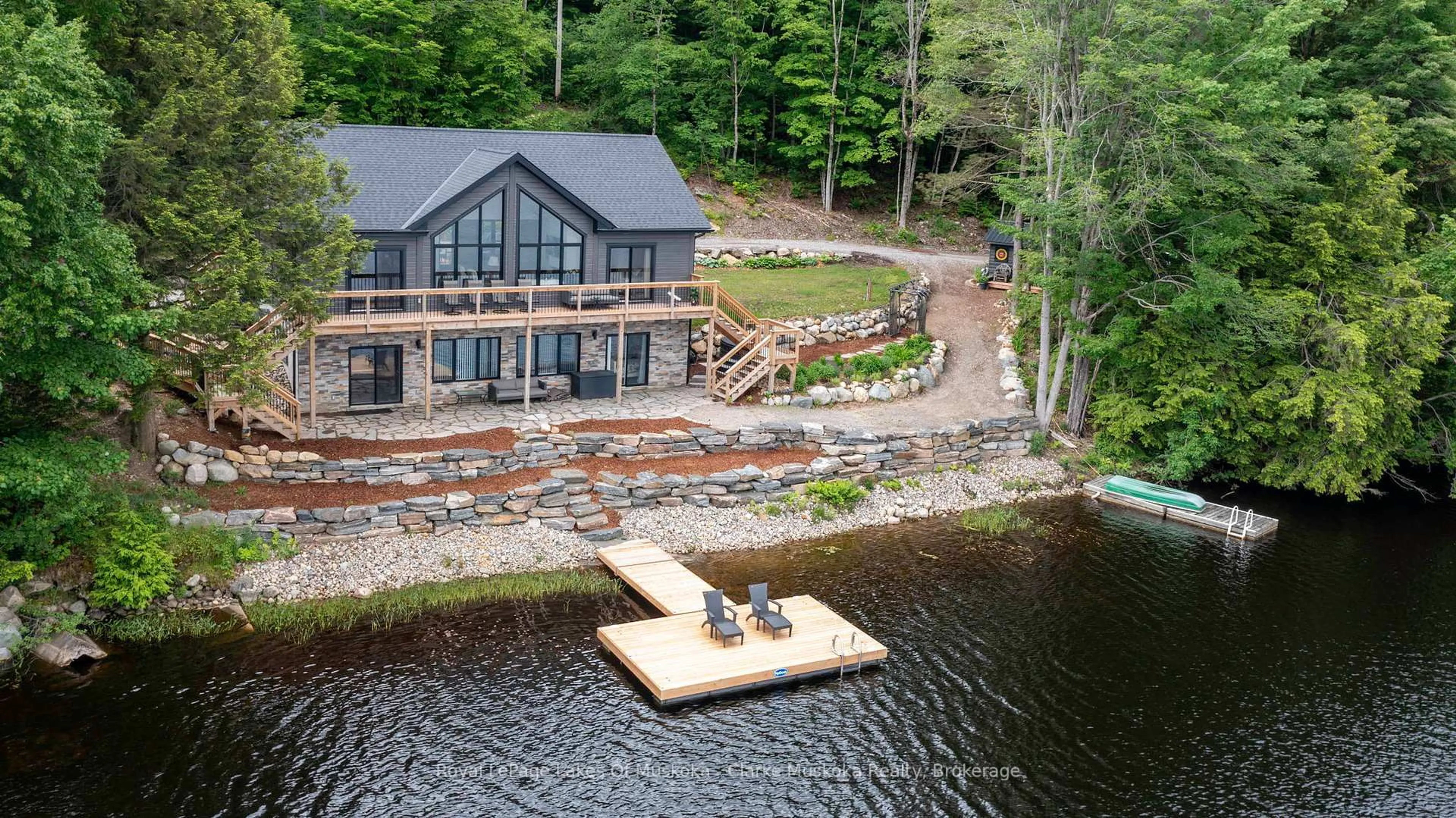 A pic from outside/outdoor area/front of a property/back of a property/a pic from drone, water/lake/river/ocean view for 1044 Youngs Rd Unit #3 Rd, Muskoka Lakes Ontario P0B 1J0