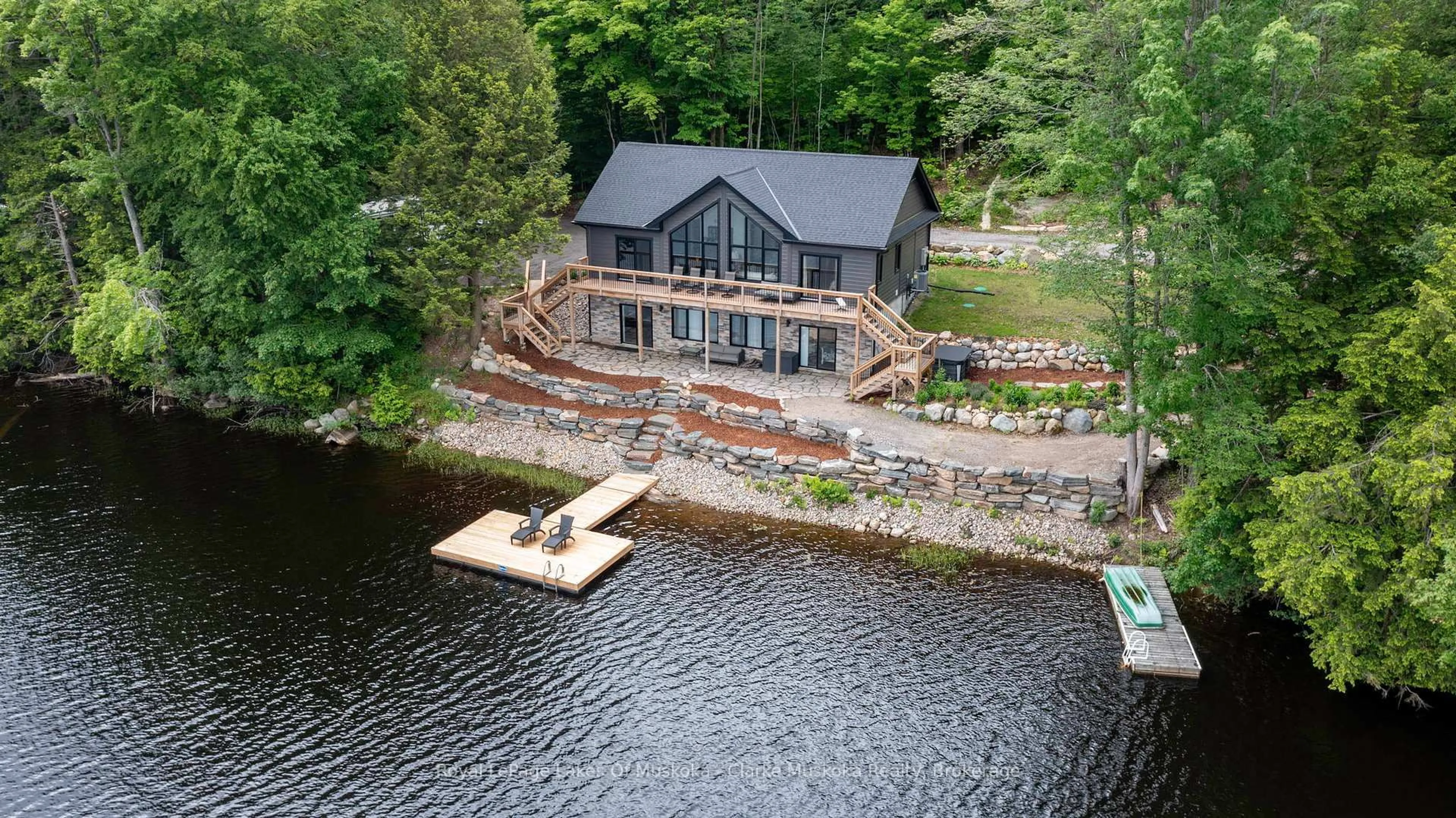 A pic from outside/outdoor area/front of a property/back of a property/a pic from drone, water/lake/river/ocean view for 1044 Youngs Rd Unit #3 Rd, Muskoka Lakes Ontario P0B 1J0