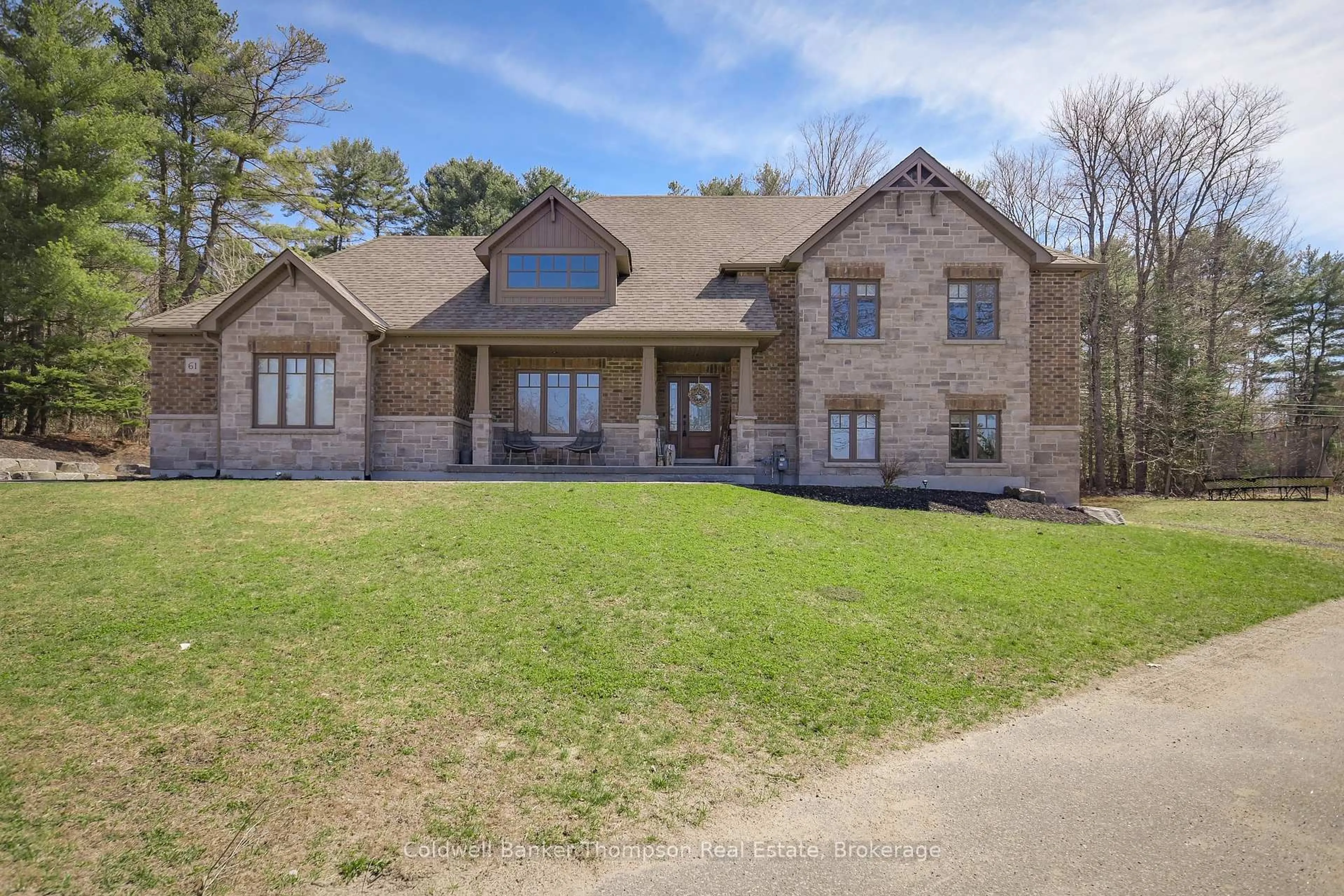 Home with brick exterior material, street for 61 Homestead Lane, Huntsville Ontario P1H 2N8