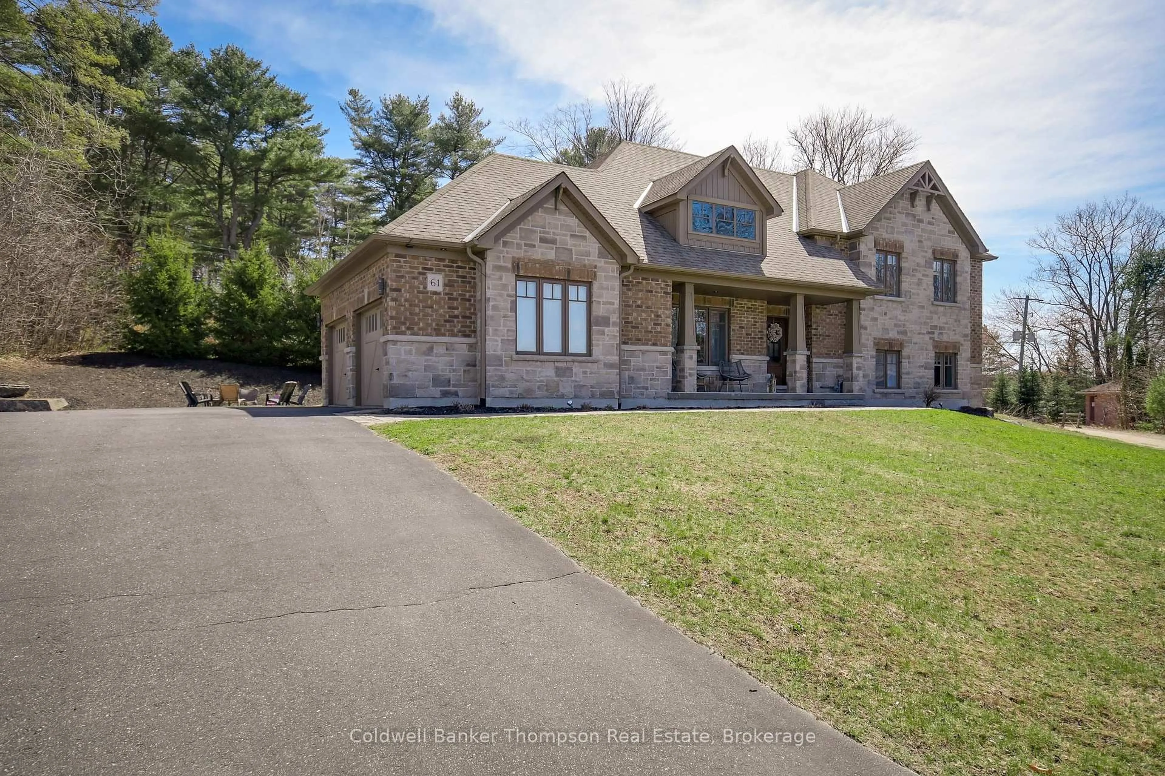 Home with brick exterior material, street for 61 Homestead Lane, Huntsville Ontario P1H 2N8