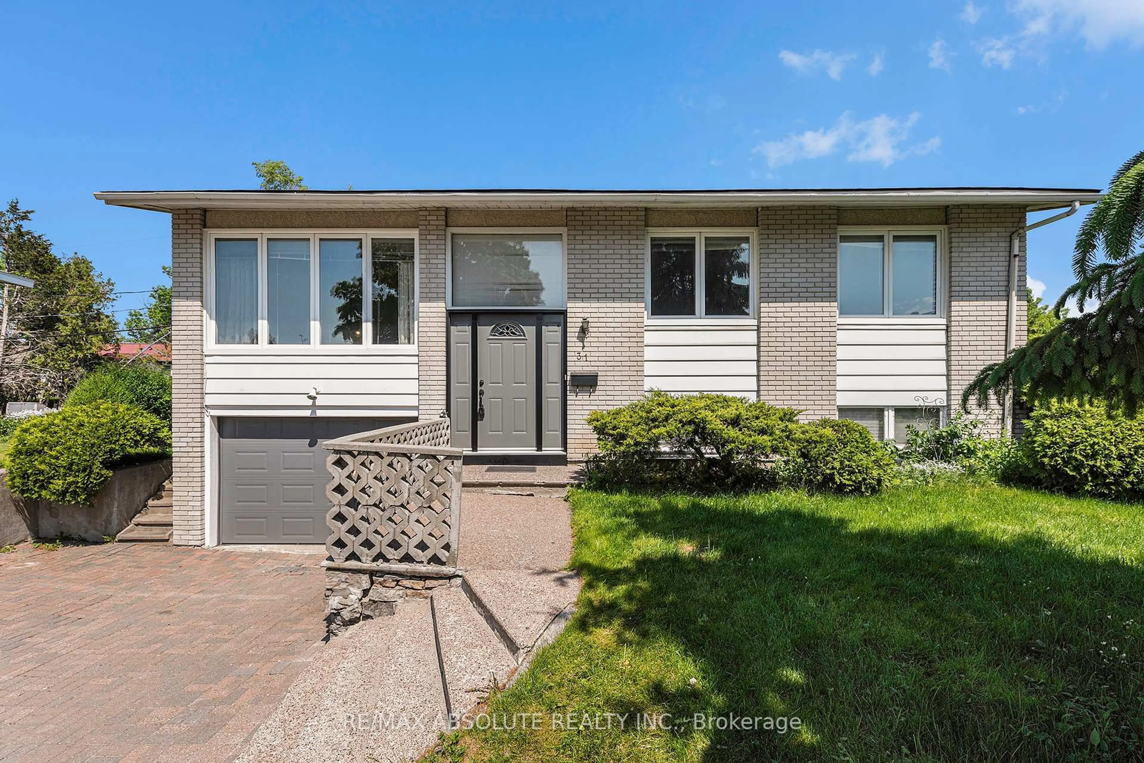 Home with vinyl exterior material, street for 31 BELLFIELD St, Ottawa Ontario K2B 6K7