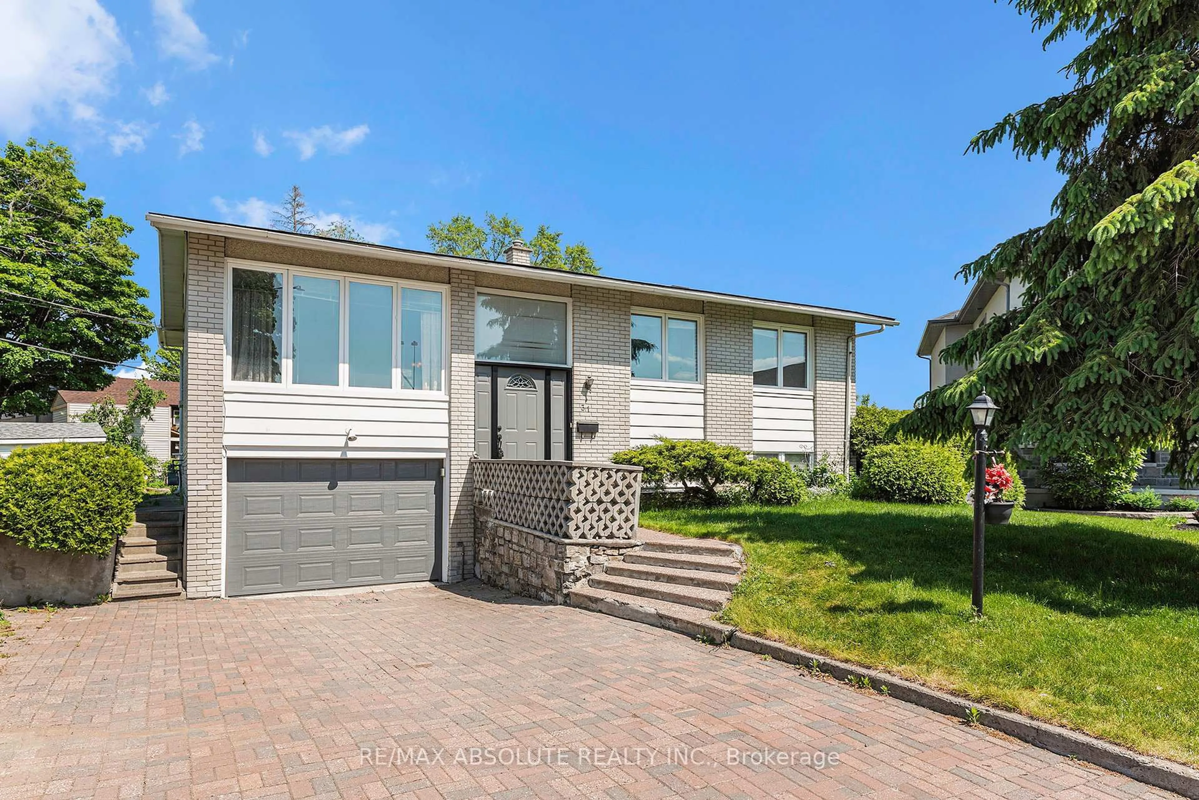 Home with vinyl exterior material, street for 31 BELLFIELD St, Ottawa Ontario K2B 6K7