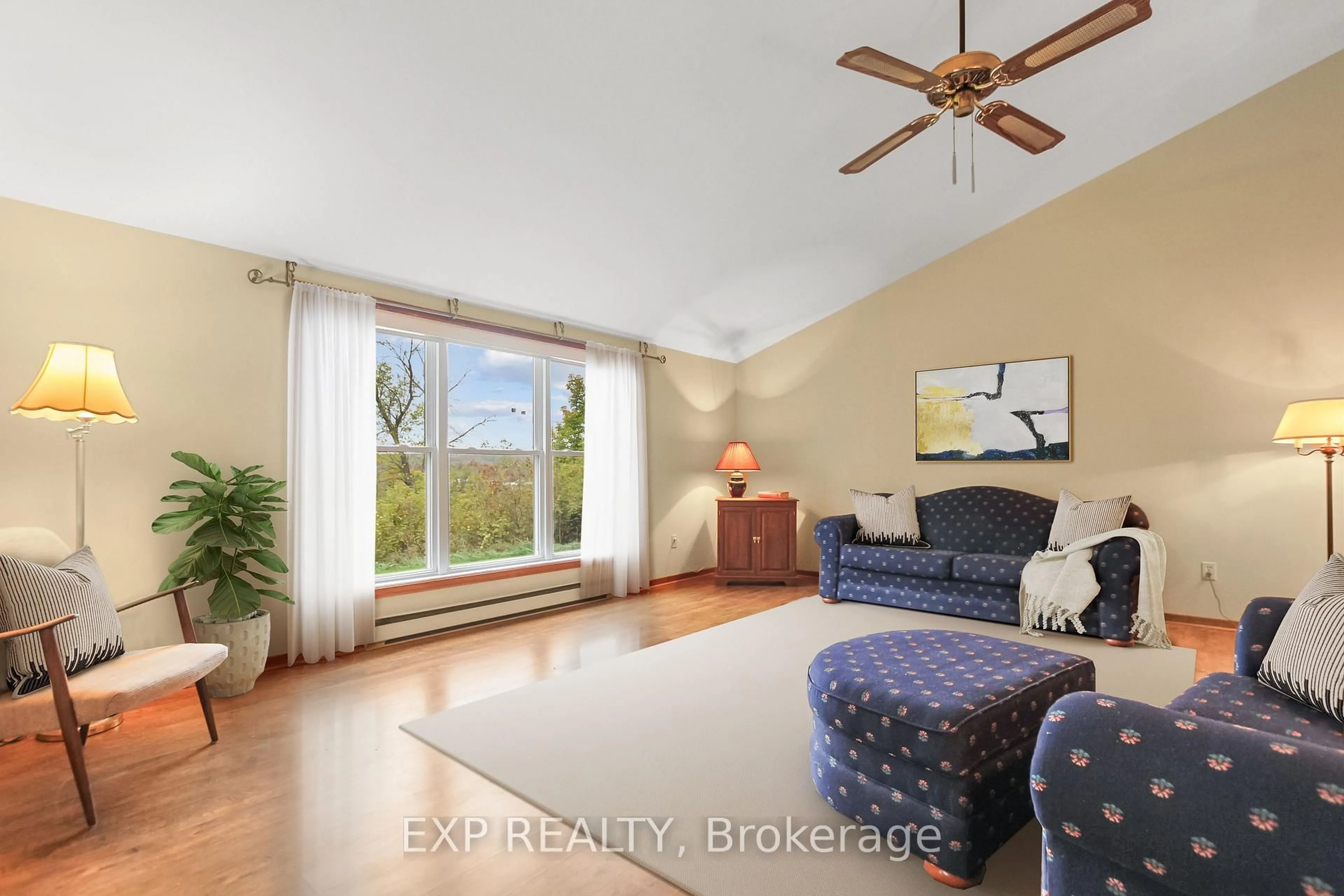 Living room with furniture, wood/laminate floor for 4817 KINBURN SIDE Rd, Pakenham Ontario K0A 2X0