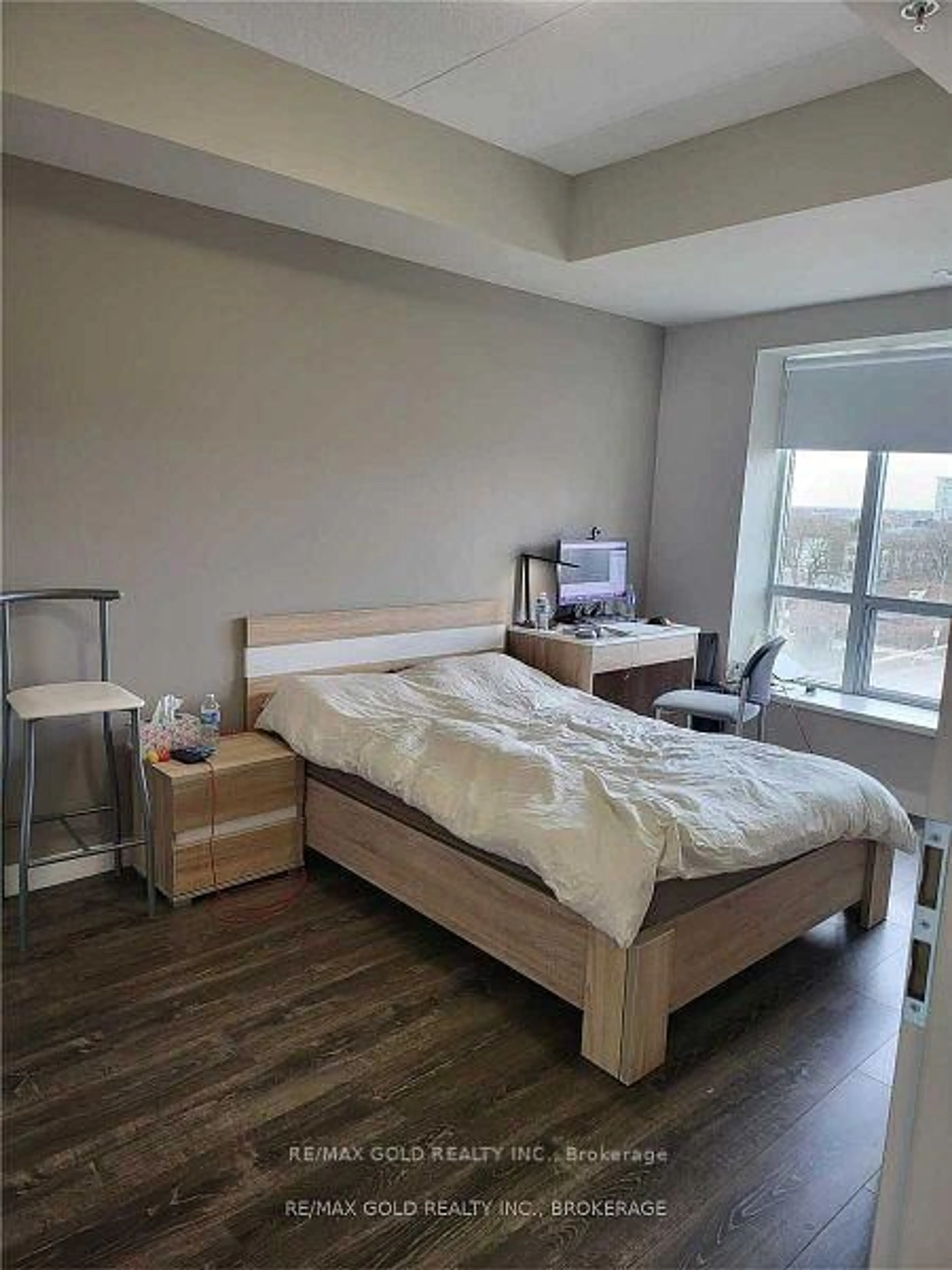 Bedroom with bed, wood/laminate floor for 280 Lester St #623, Waterloo Ontario N2L 0G2