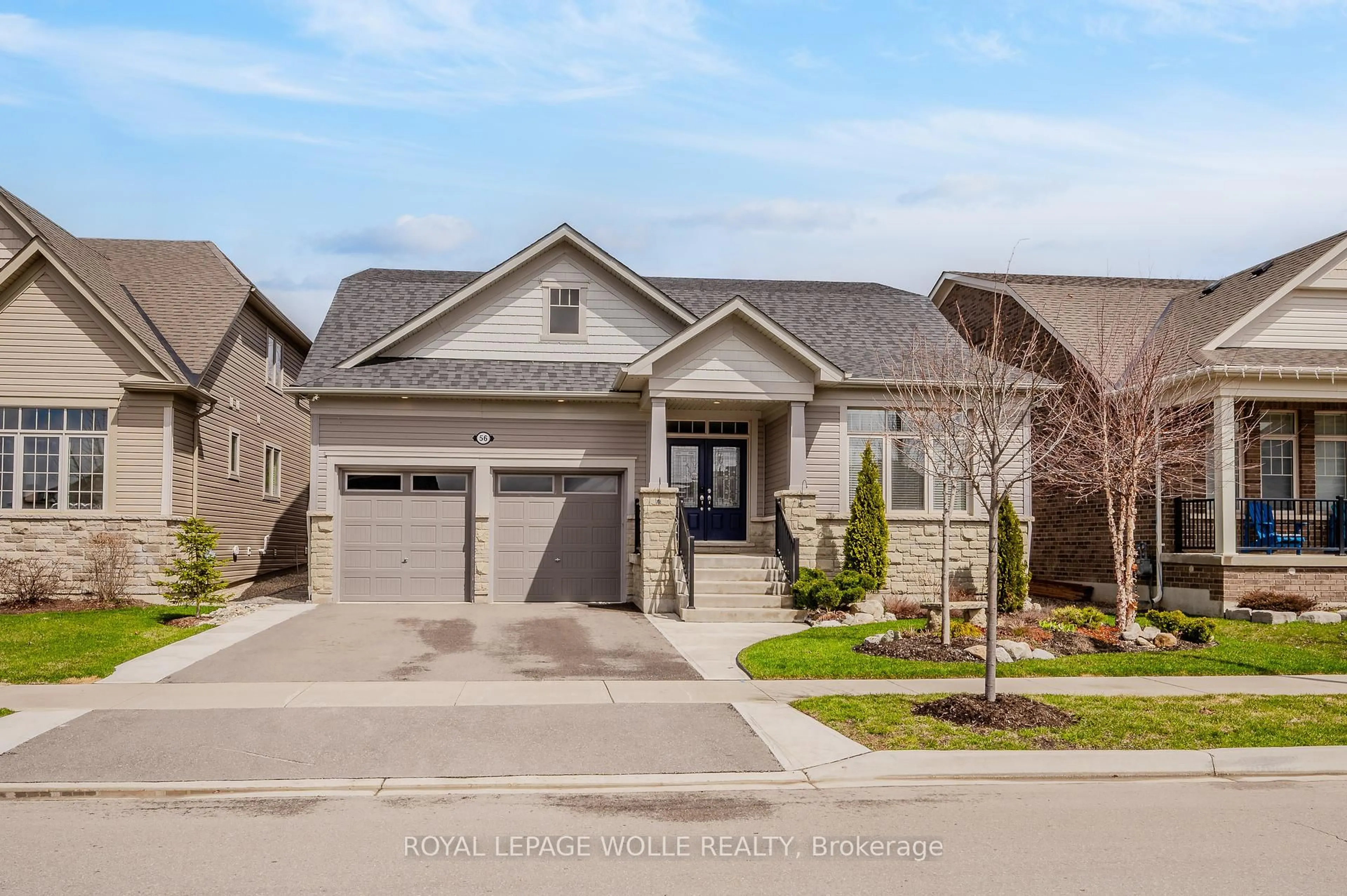 Home with brick exterior material, street for 56 Harpin Way, Centre Wellington Ontario N1M 0H1