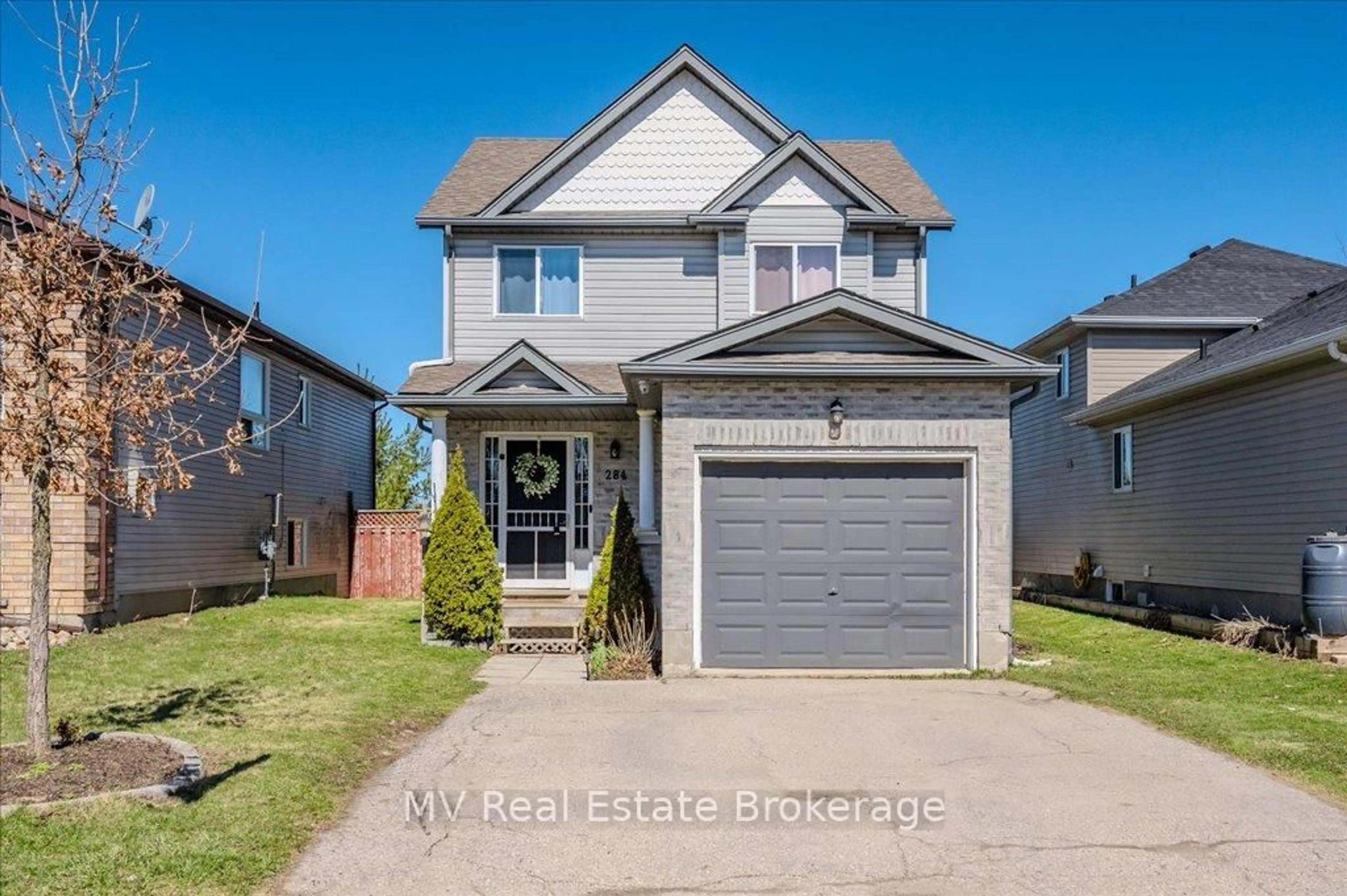 Home with vinyl exterior material, street for 284 Millburn Blvd, Centre Wellington Ontario N1M 3S3