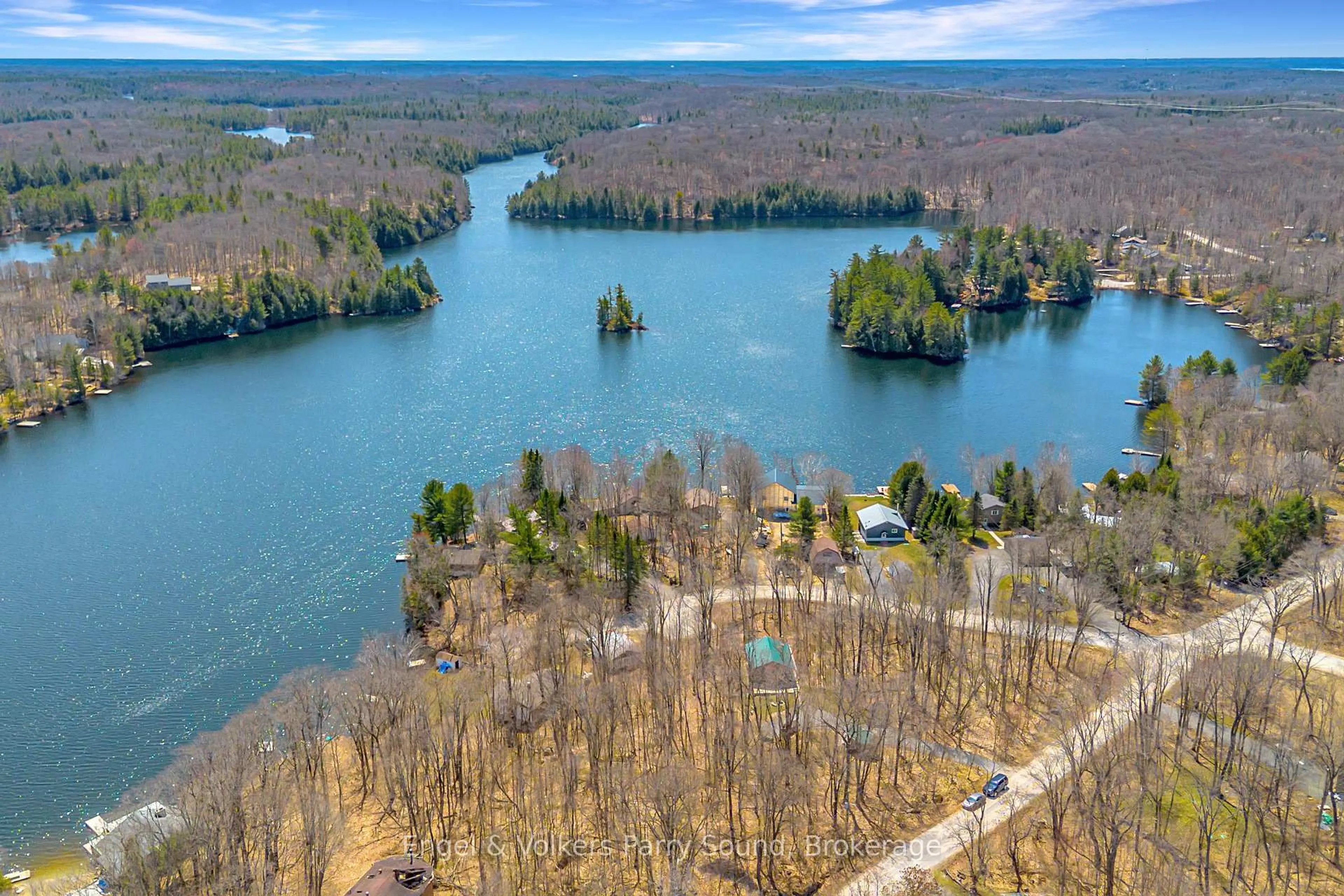 A pic from outside/outdoor area/front of a property/back of a property/a pic from drone, water/lake/river/ocean view for 107 Pinewood Rd, McDougall Ontario P2A 2W7