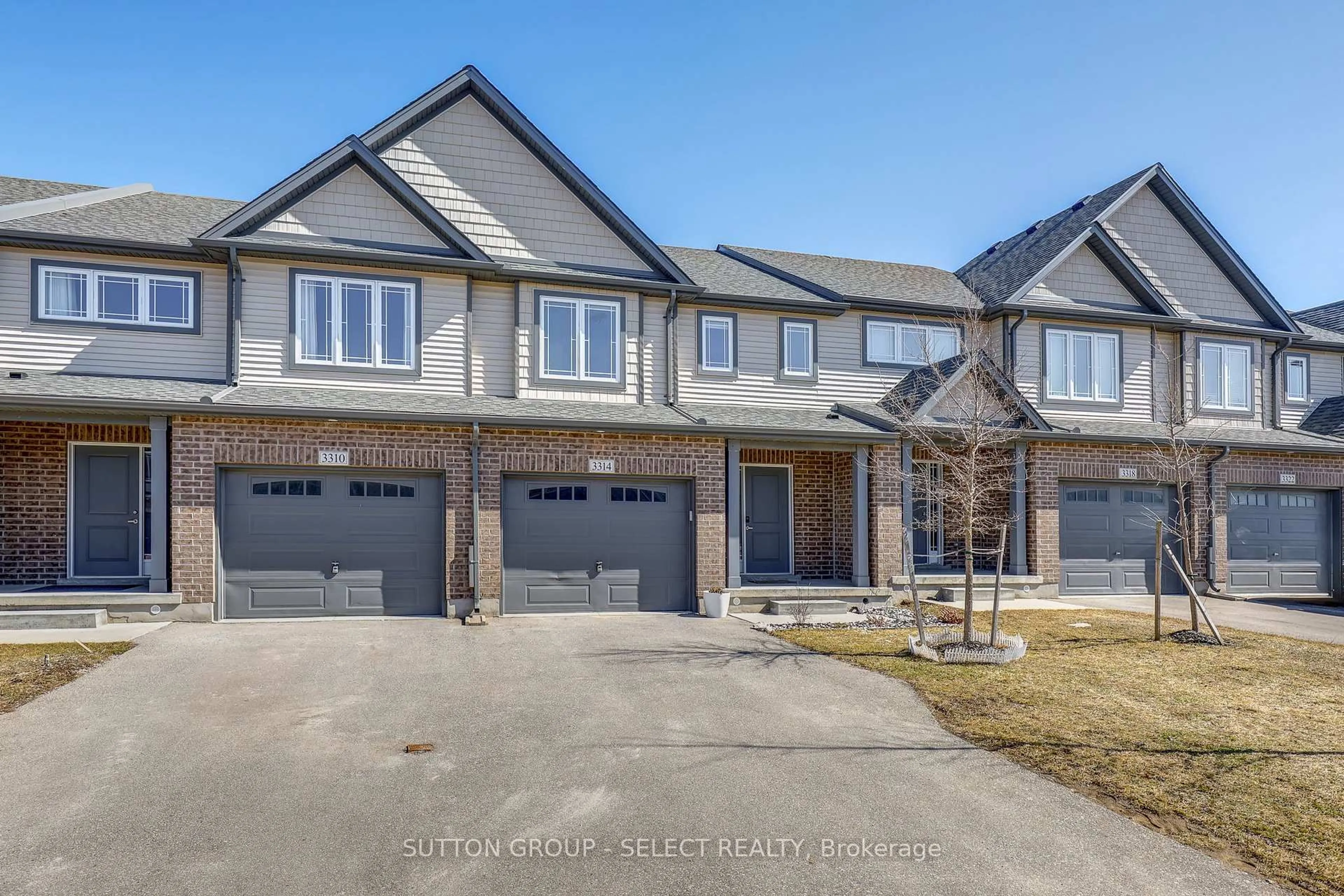 Home with brick exterior material, street for 3314 Strawberry Walk, London South Ontario N6M 0E9