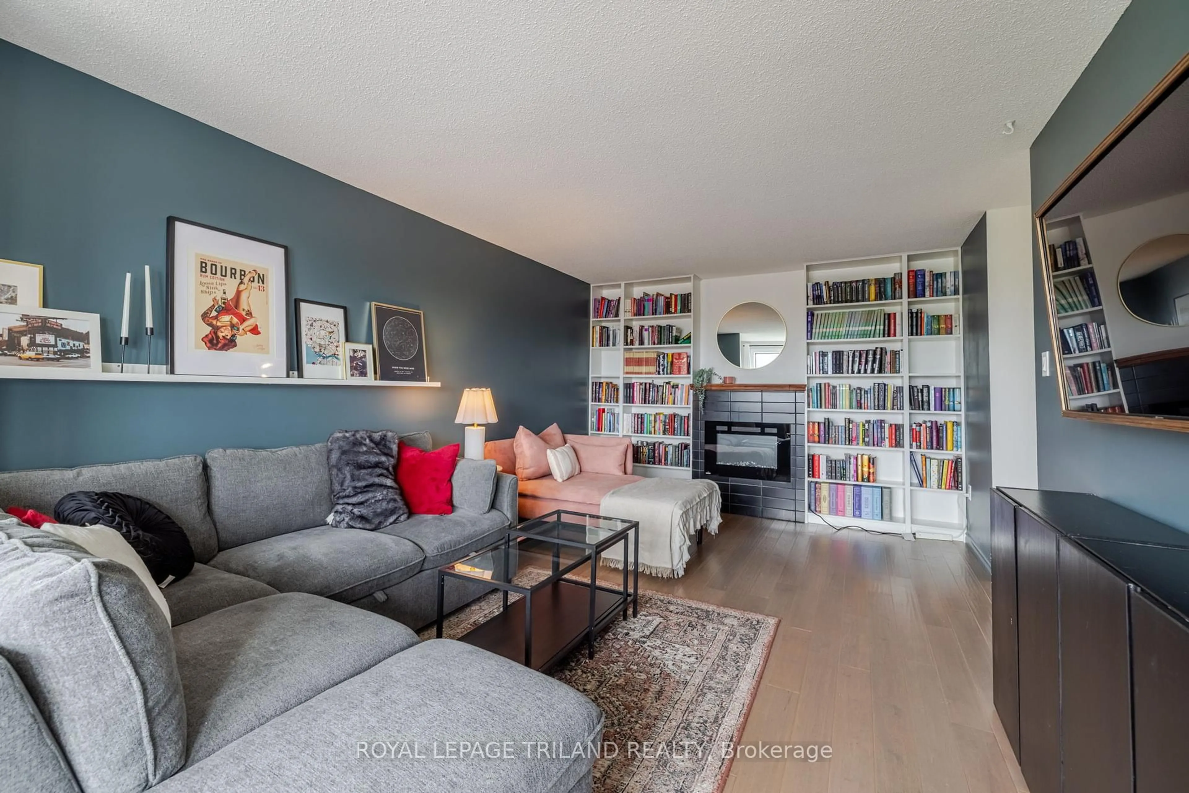 Living room with furniture, wood/laminate floor for 650 Cheapside St #504, London East Ontario N5Y 5J8