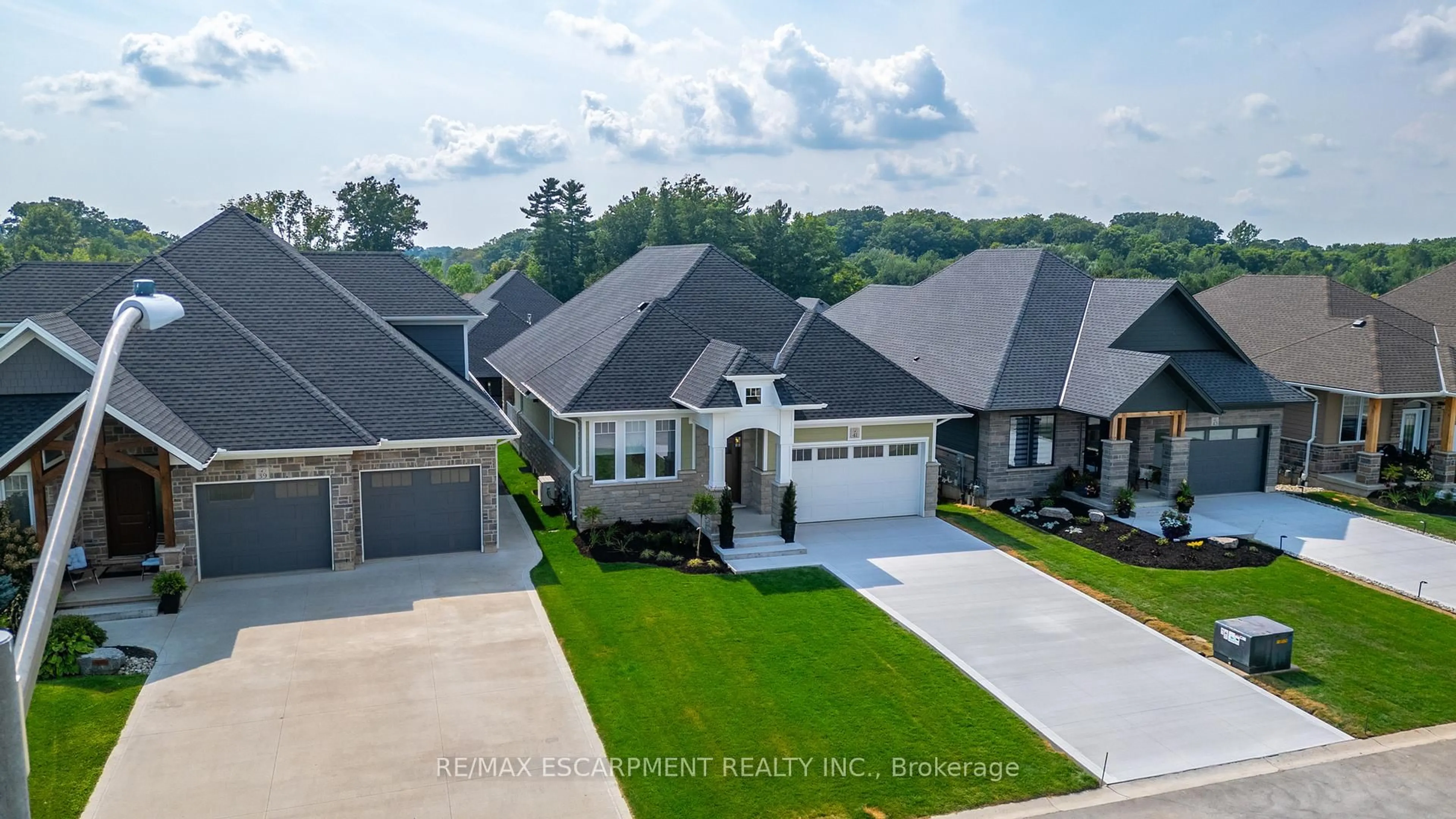 A pic from outside/outdoor area/front of a property/back of a property/a pic from drone, street for 41 Bluenose Dr, Norfolk Ontario N0A 1N7