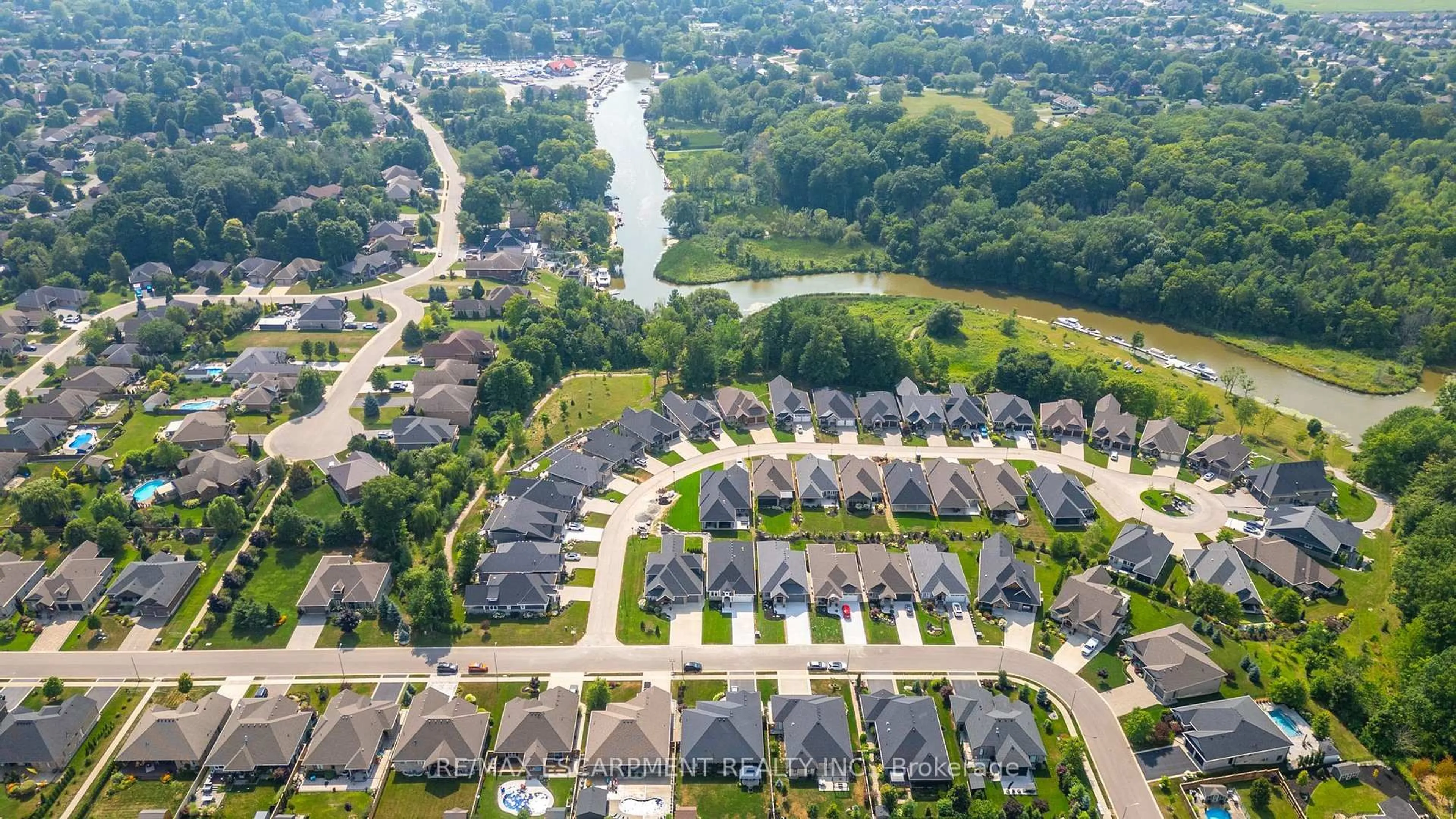 A pic from outside/outdoor area/front of a property/back of a property/a pic from drone, street for 41 Bluenose Dr, Norfolk Ontario N0A 1N7