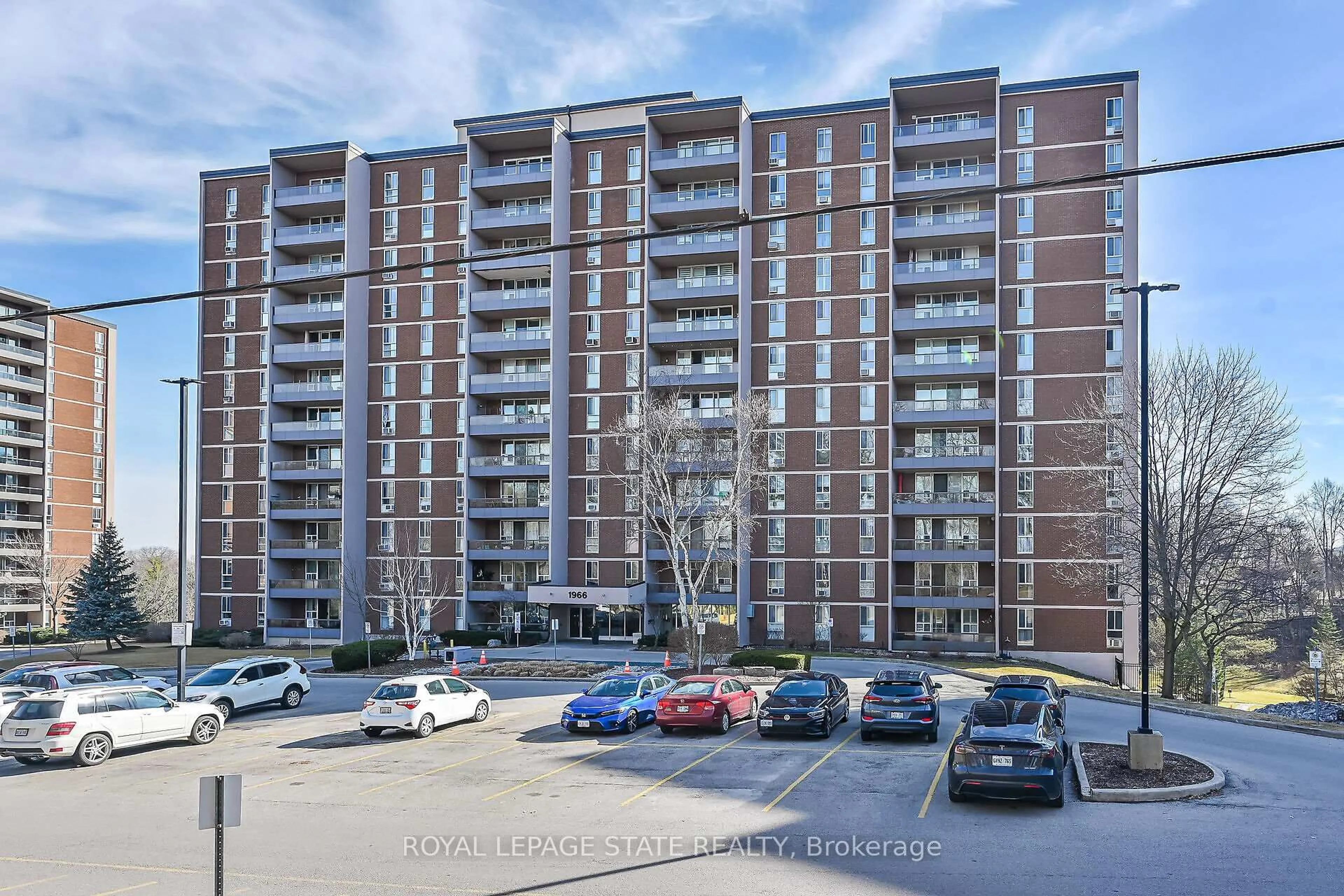A pic from outside/outdoor area/front of a property/back of a property/a pic from drone, unknown for 1966 Main St #203, Hamilton Ontario L8S 1J6