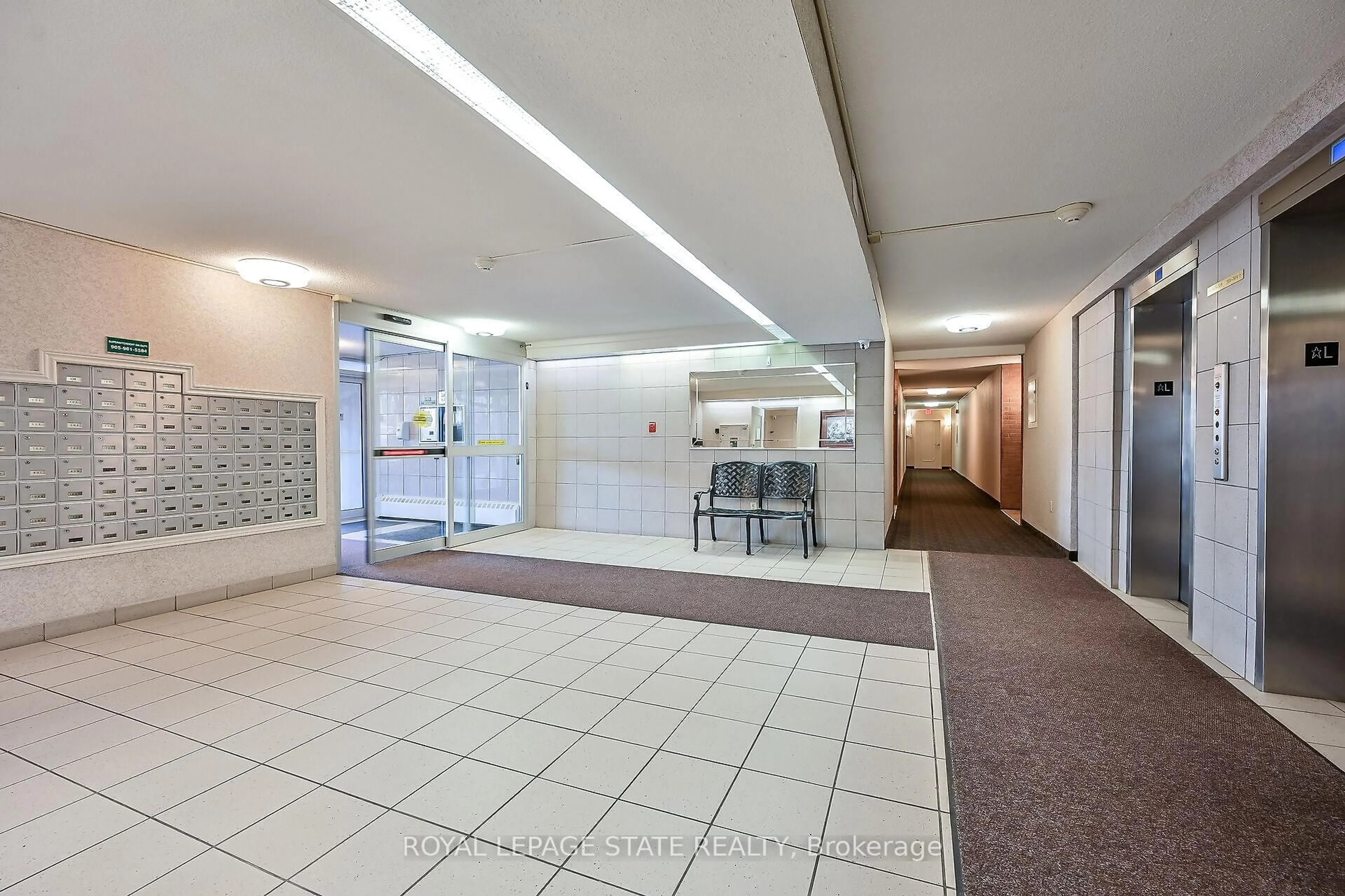 Indoor foyer for 1966 Main St #203, Hamilton Ontario L8S 1J6