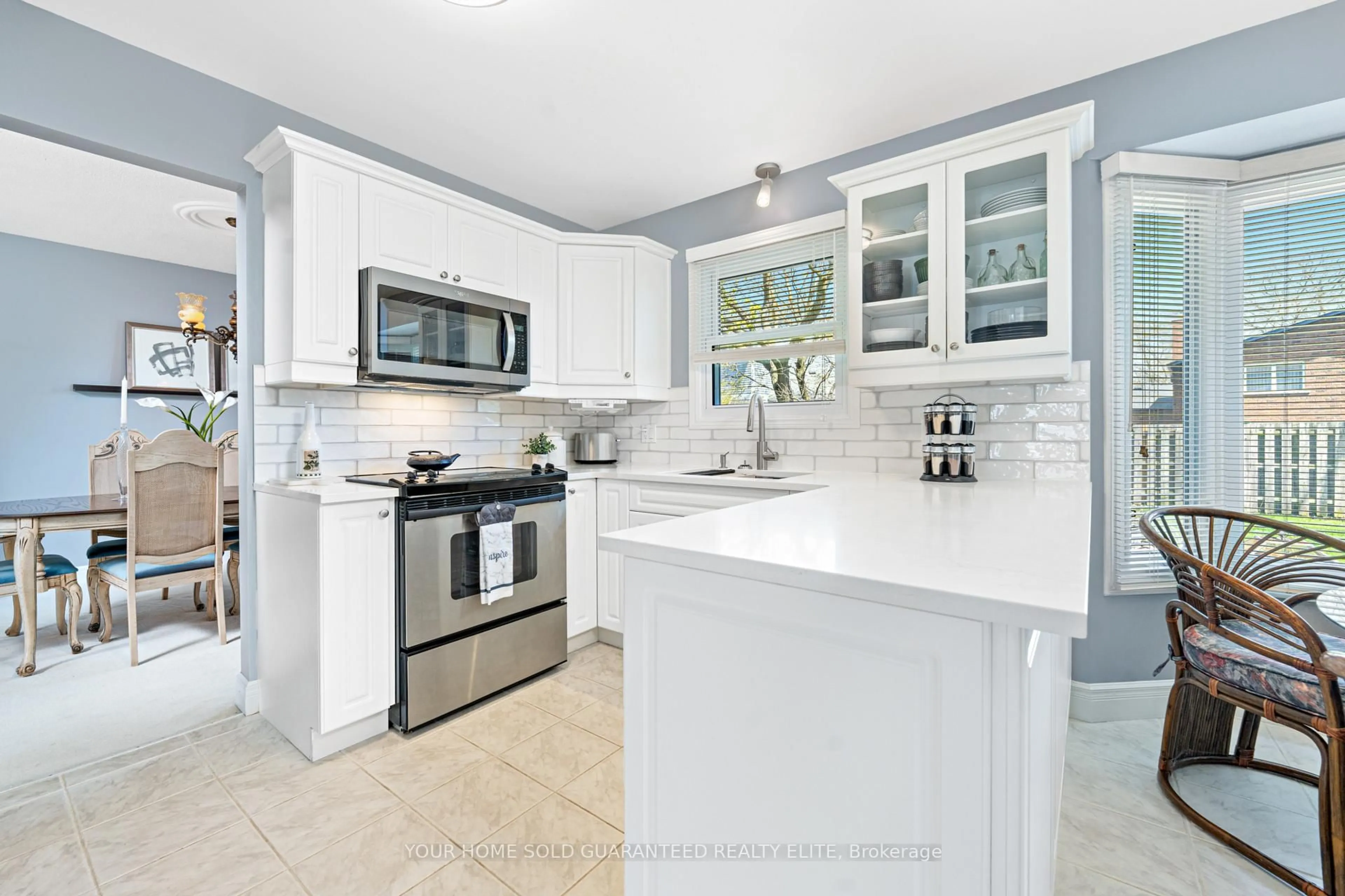 Open concept kitchen, ceramic/tile floor for 8 Coupland Crt, Welland Ontario L3C 6M7