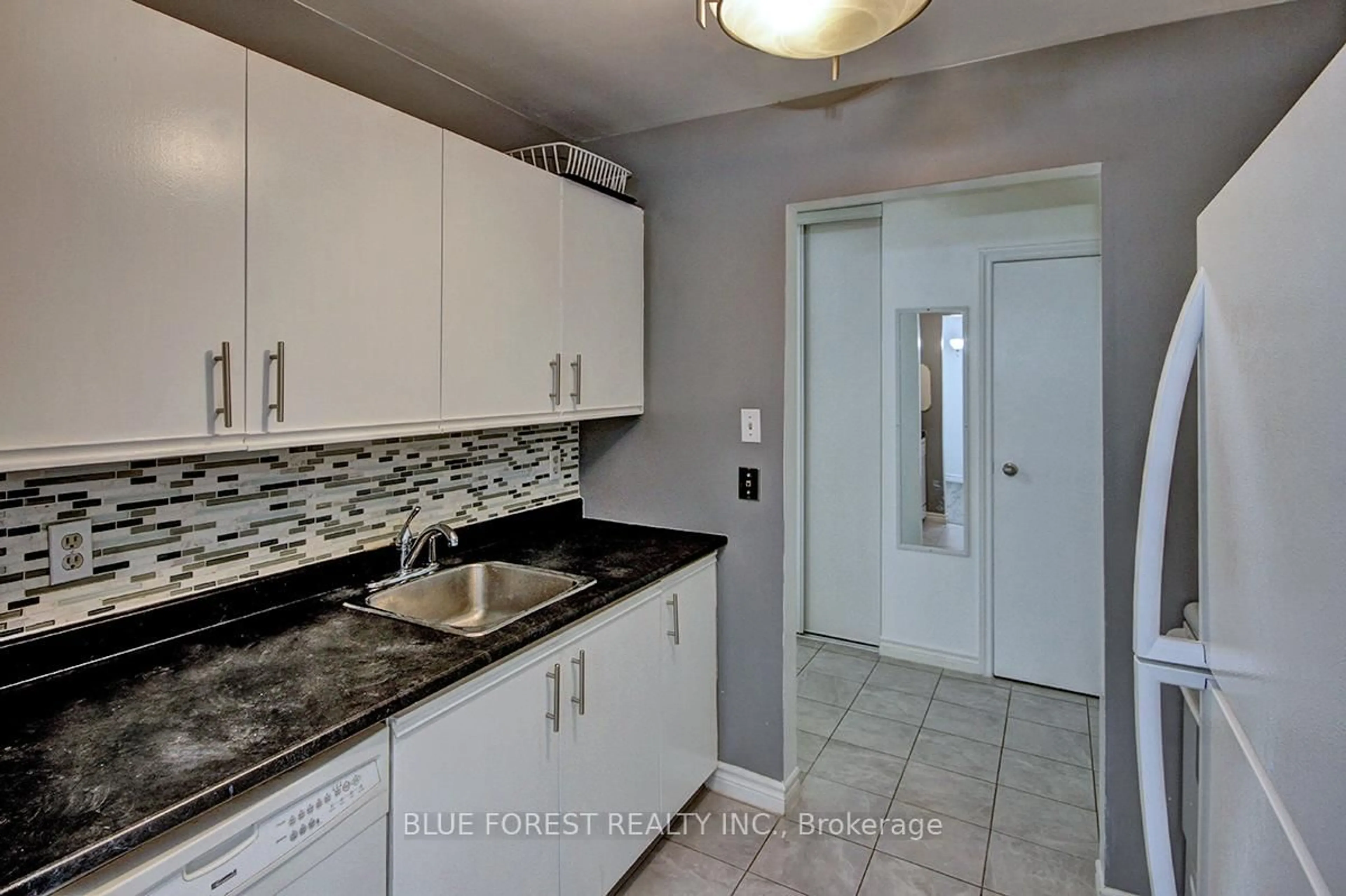 Standard kitchen, ceramic/tile floor for 739 Deveron Cres #209, London South Ontario N5Z 4Y1