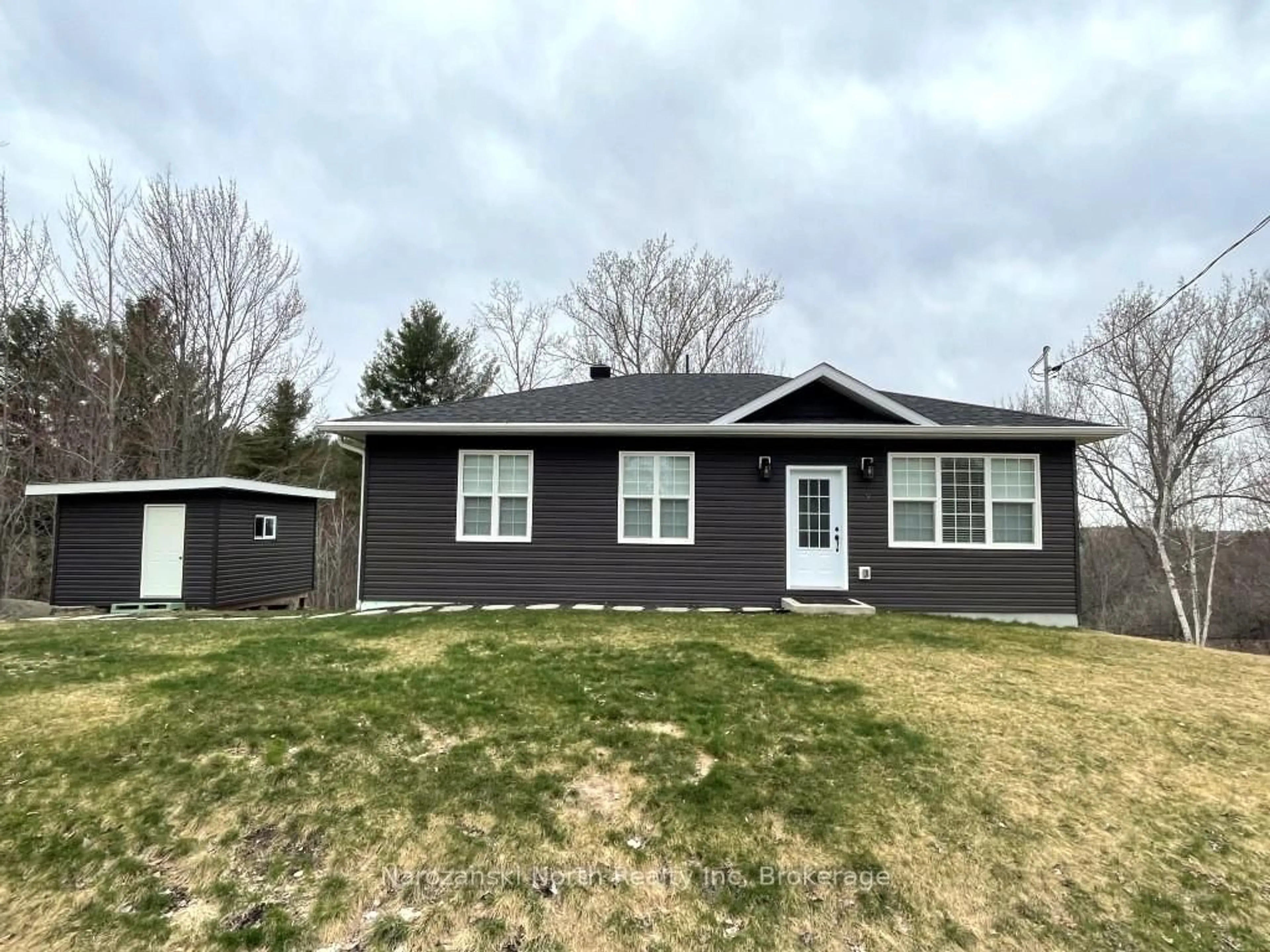 Home with vinyl exterior material, street for 9 Chevrefils Lane, St. Charles Ontario P0M 2W0