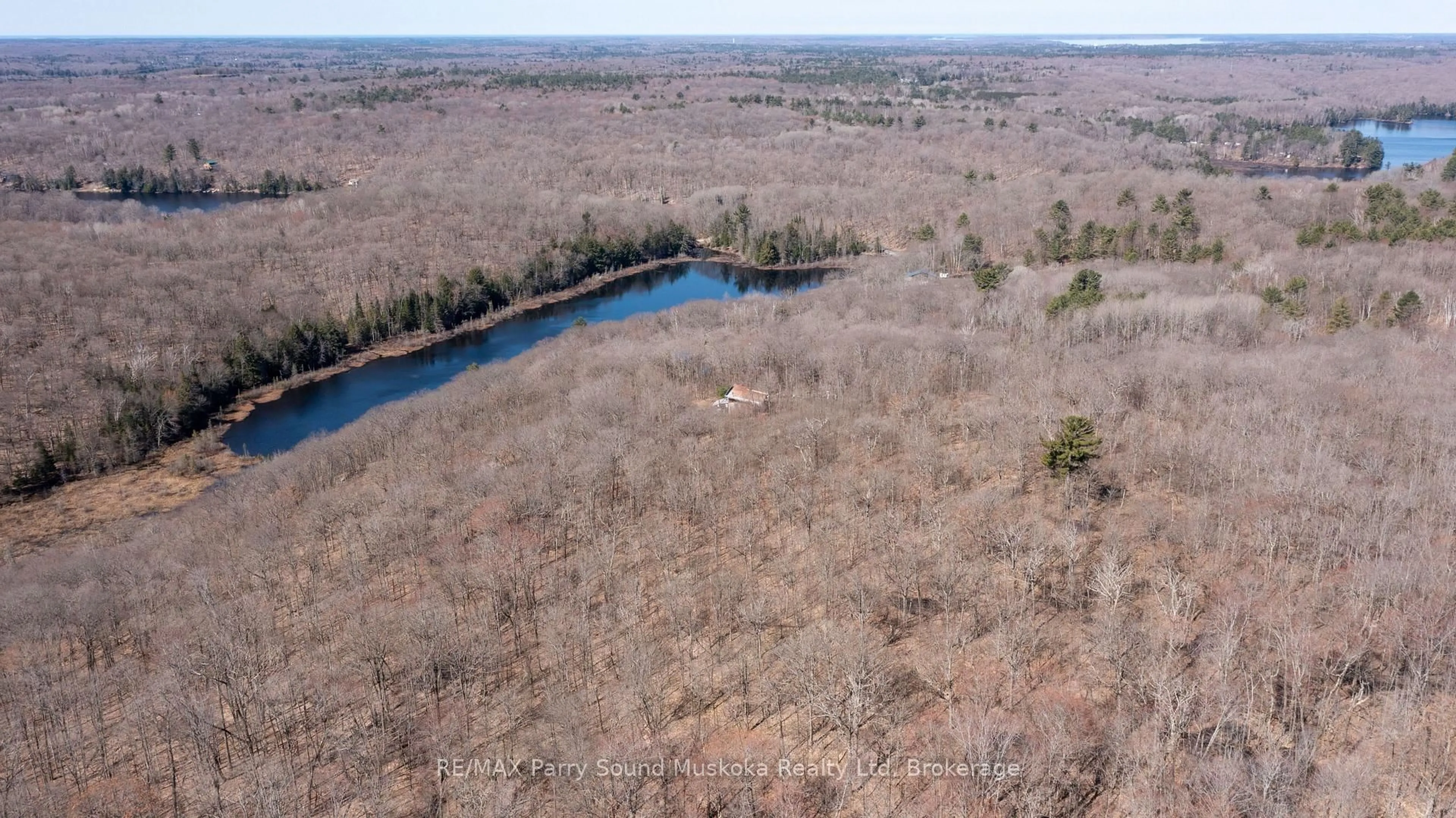 A pic from outside/outdoor area/front of a property/back of a property/a pic from drone, water/lake/river/ocean view for 36 McNaught's Rd, Seguin Ontario P2A 0B2
