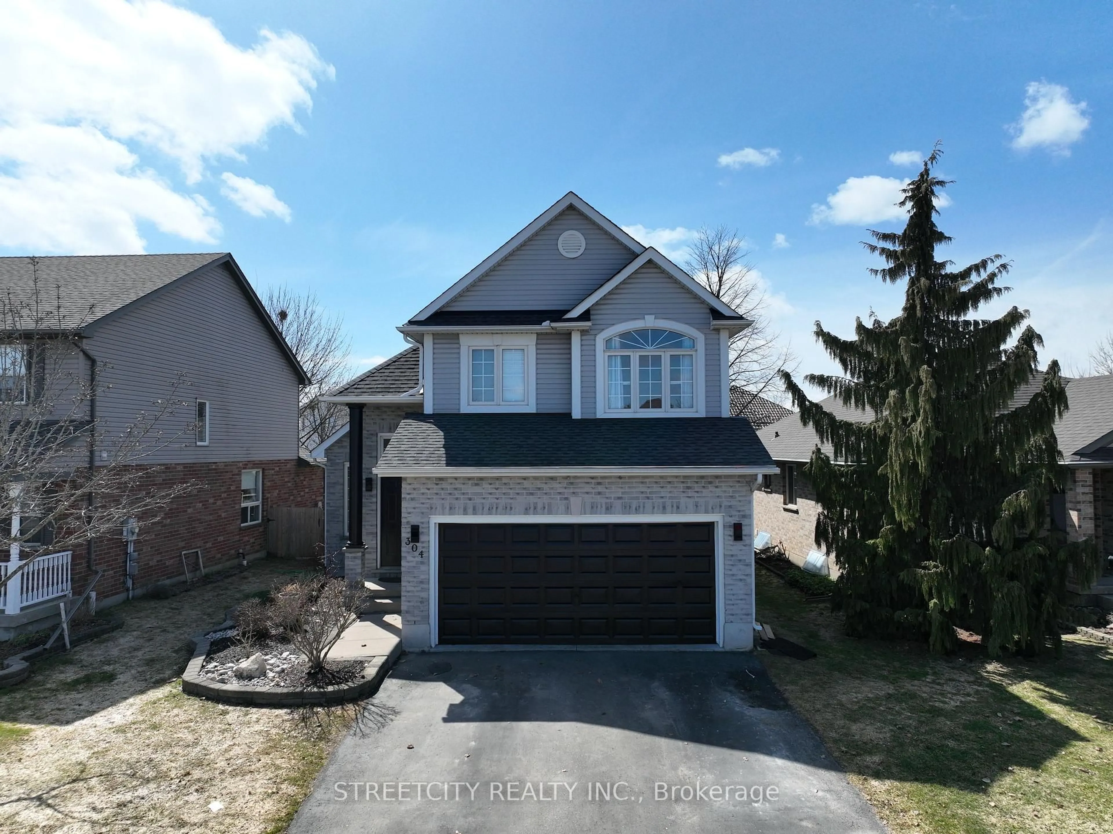 A pic from outside/outdoor area/front of a property/back of a property/a pic from drone, street for 304 White Sands Dr, London South Ontario N6M 1J2